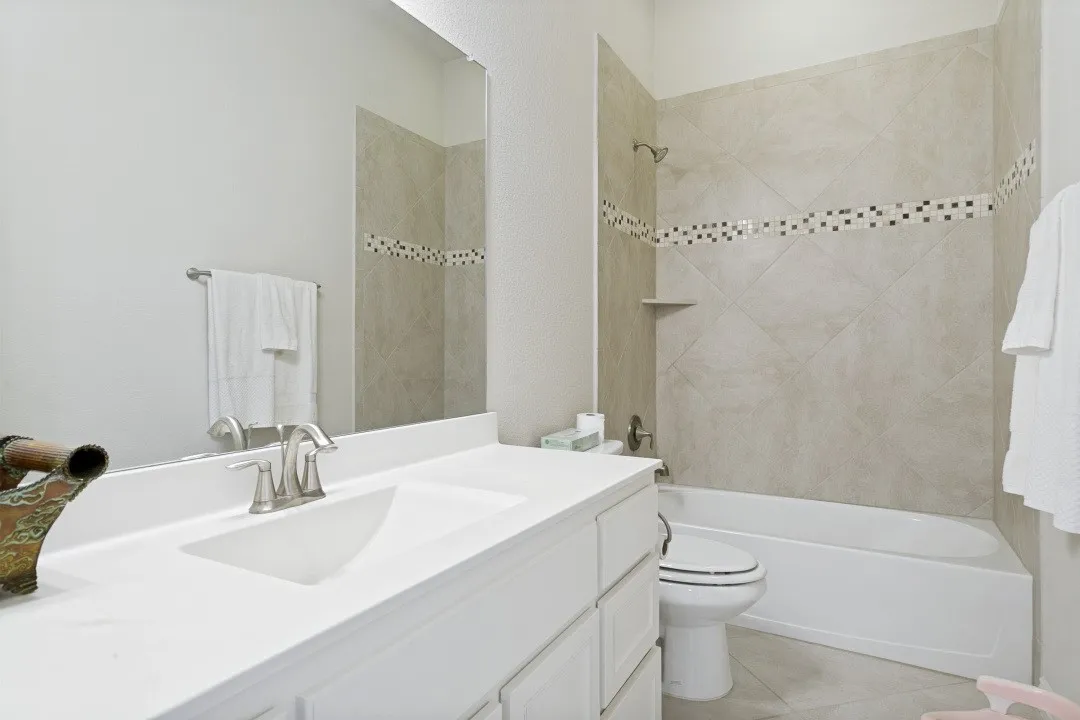 Full bath upstairs; half bath for media and game room.