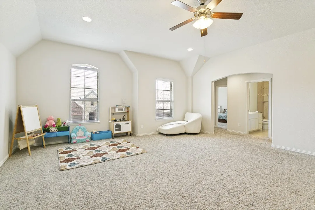 Walk upstairs to this big game room.