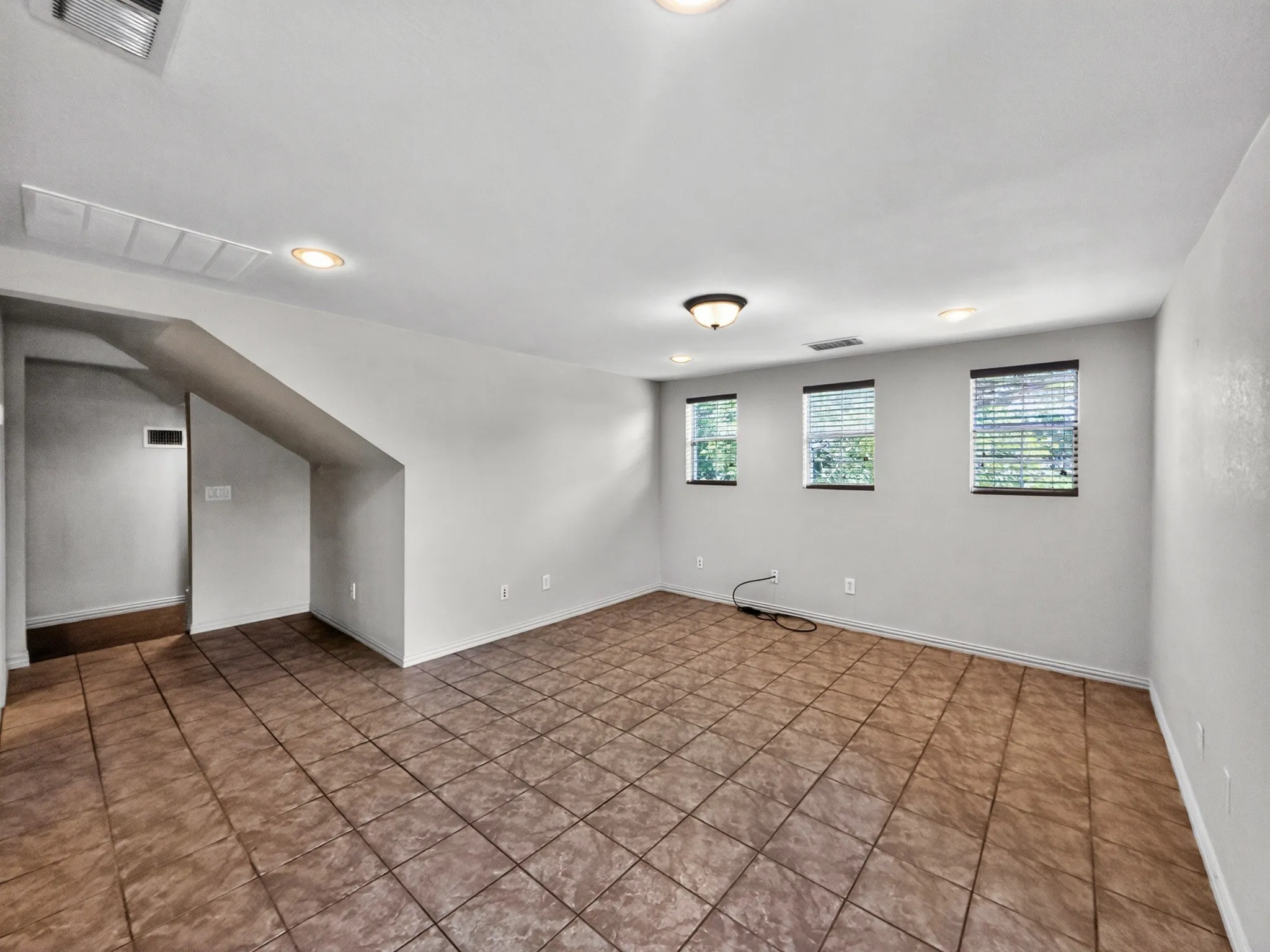 Second floor flex space make it a bedroom or media space