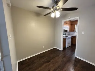 Living room. Notice the nice flooring.
