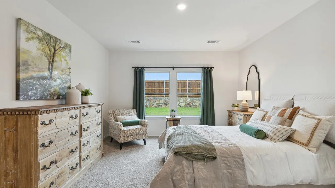 Carpeted room with a double window, recessed lighting, and white walls