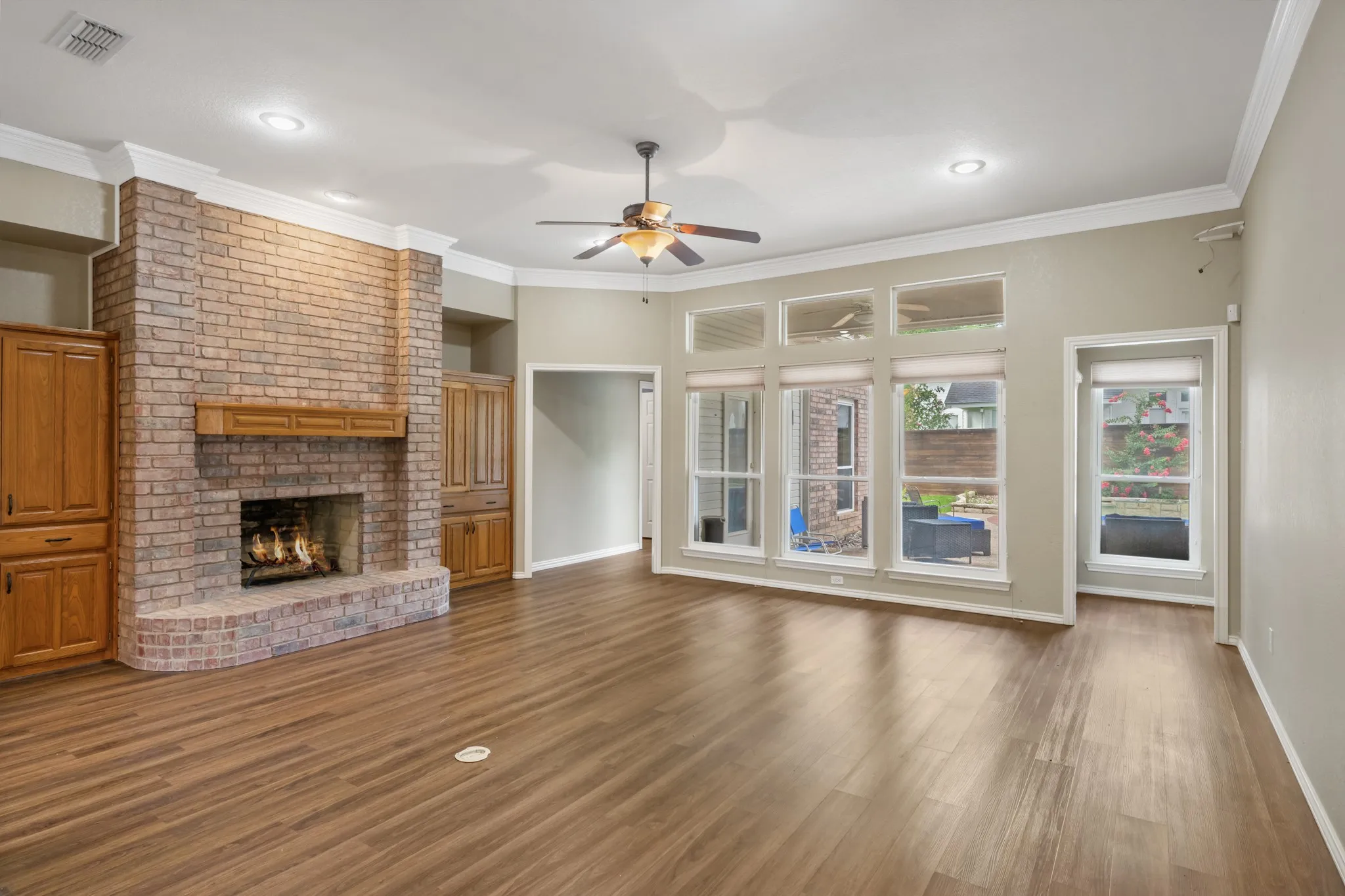 Spacious family room with a wall of windows
