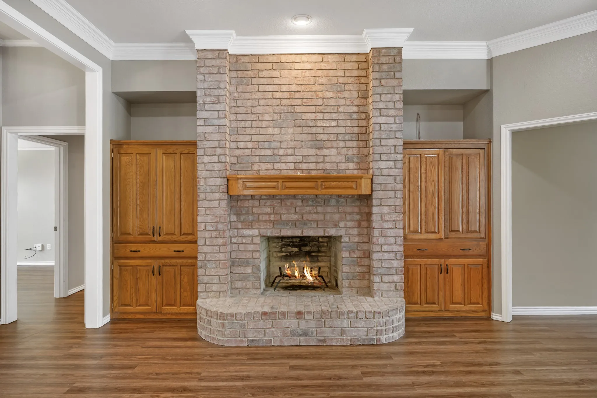 Wonderful built-ins will accommodate games, movies, books, and photo books filled with memories.
