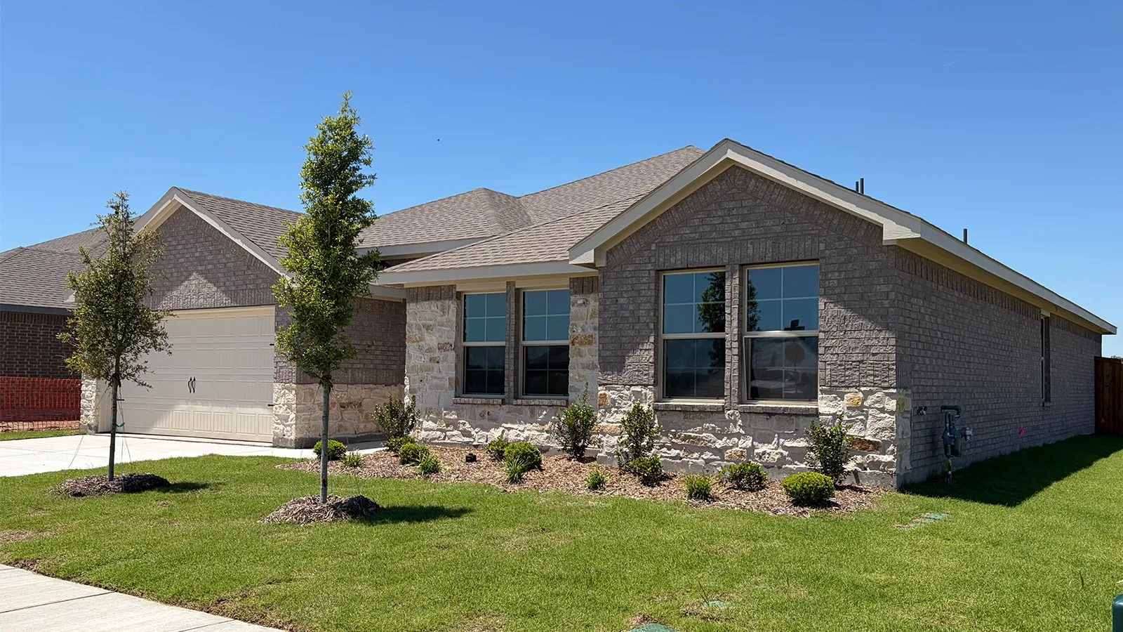 Stone and brick exterior with a pitched roof