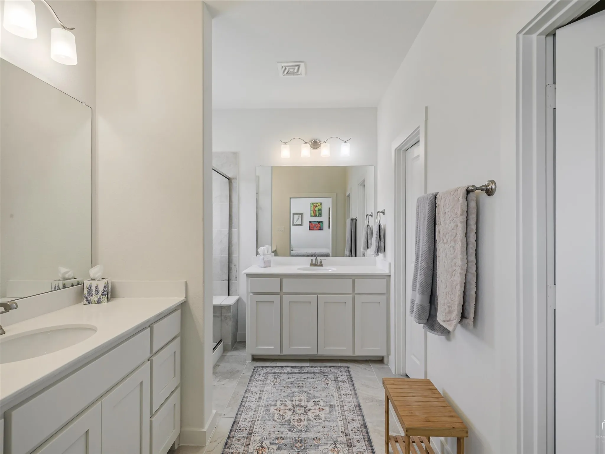 Primary Bath with separate 36" tall vanities and