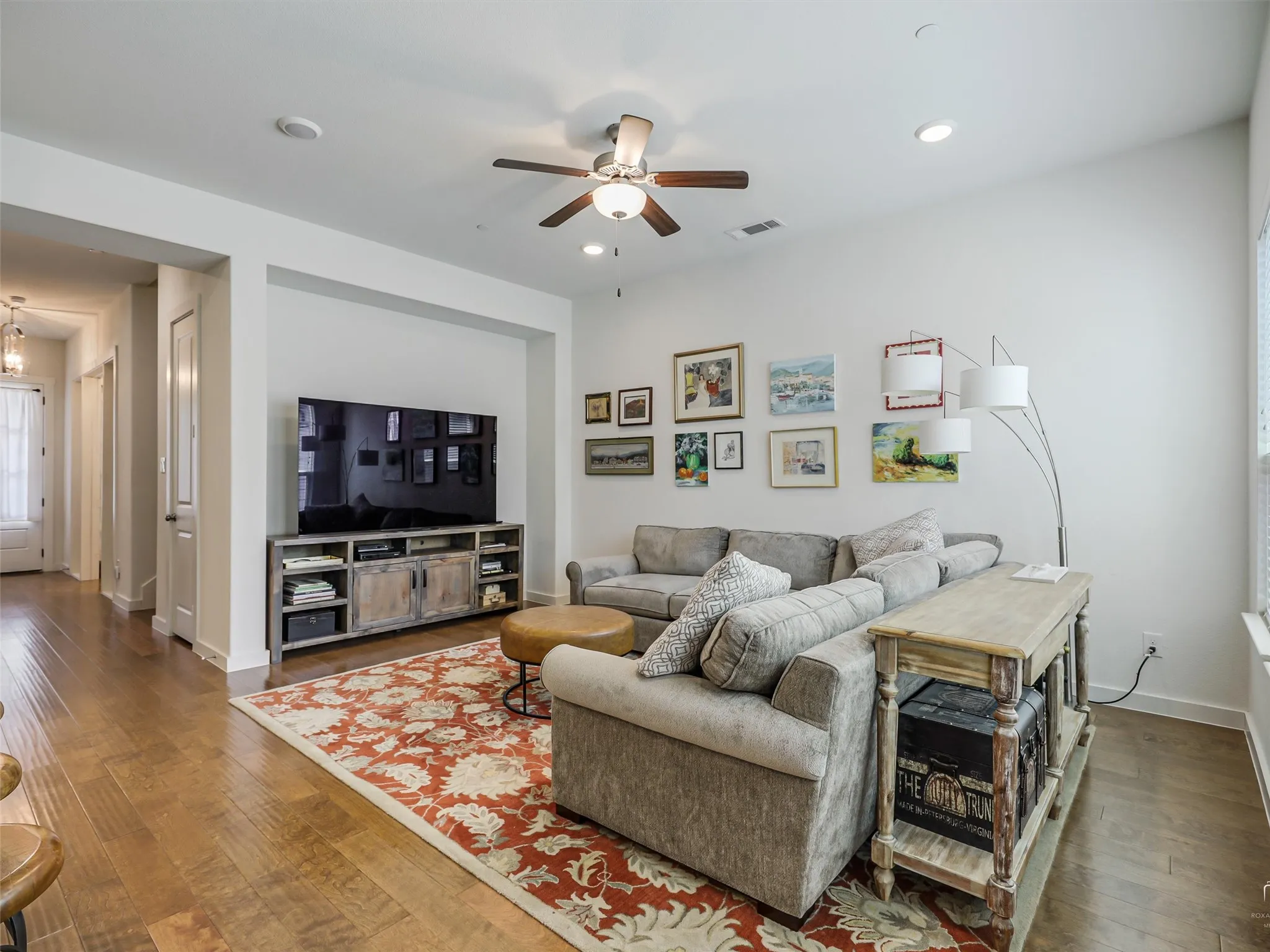 Living Room open to Kitchen and full of natural light.