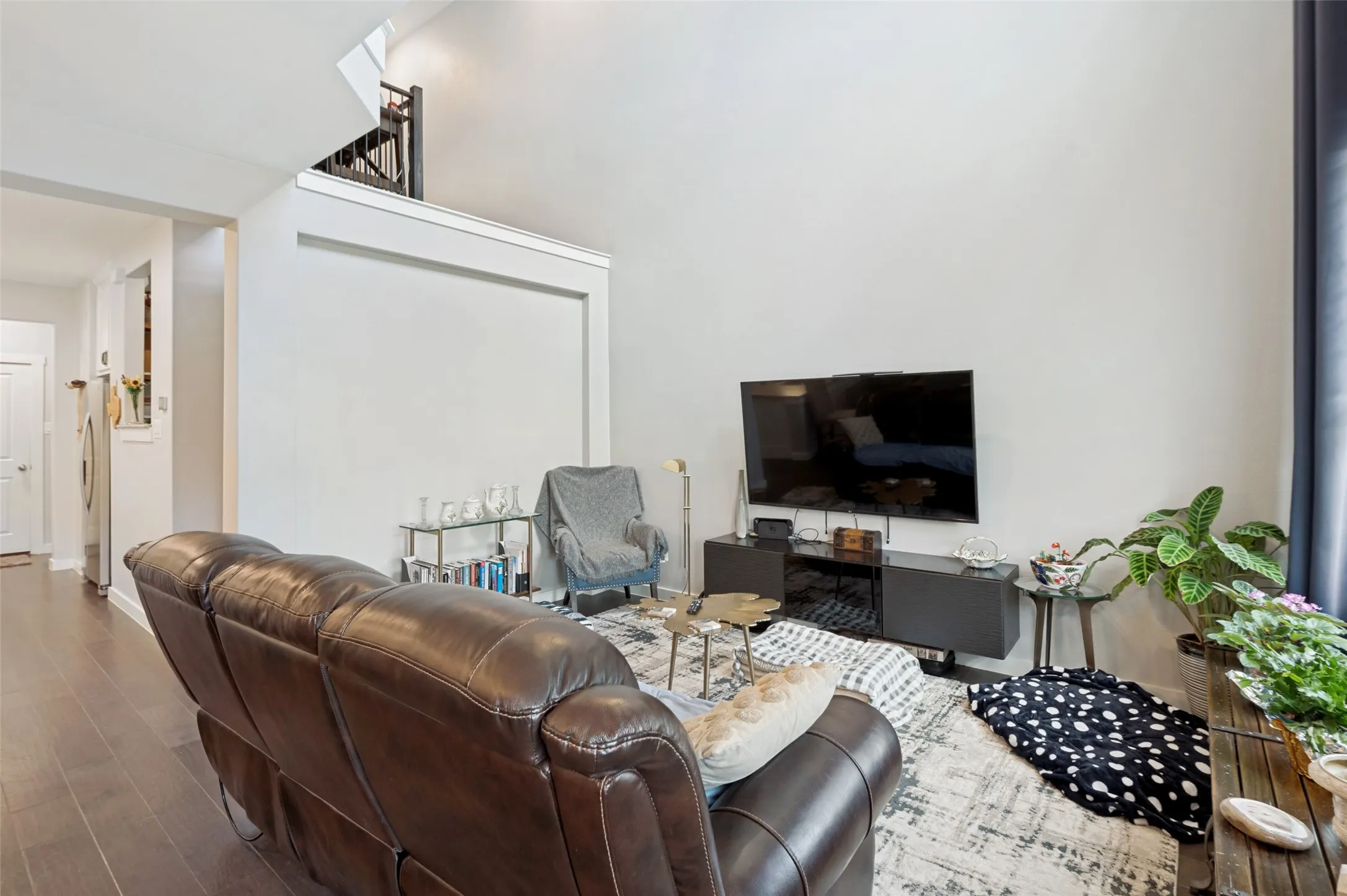Open to kitchen and dining area