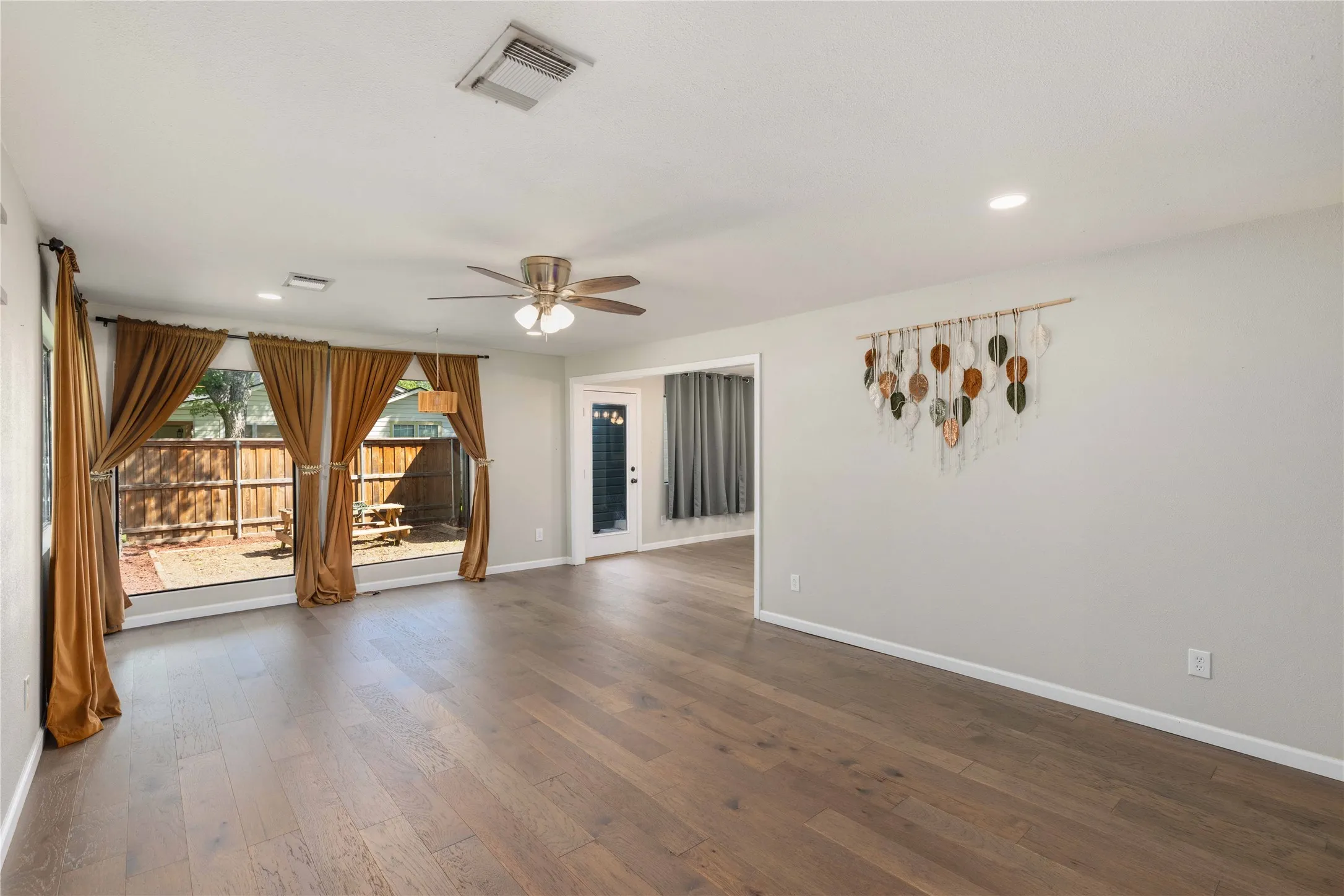 Second living room with patio doors to a side outdoor living area!