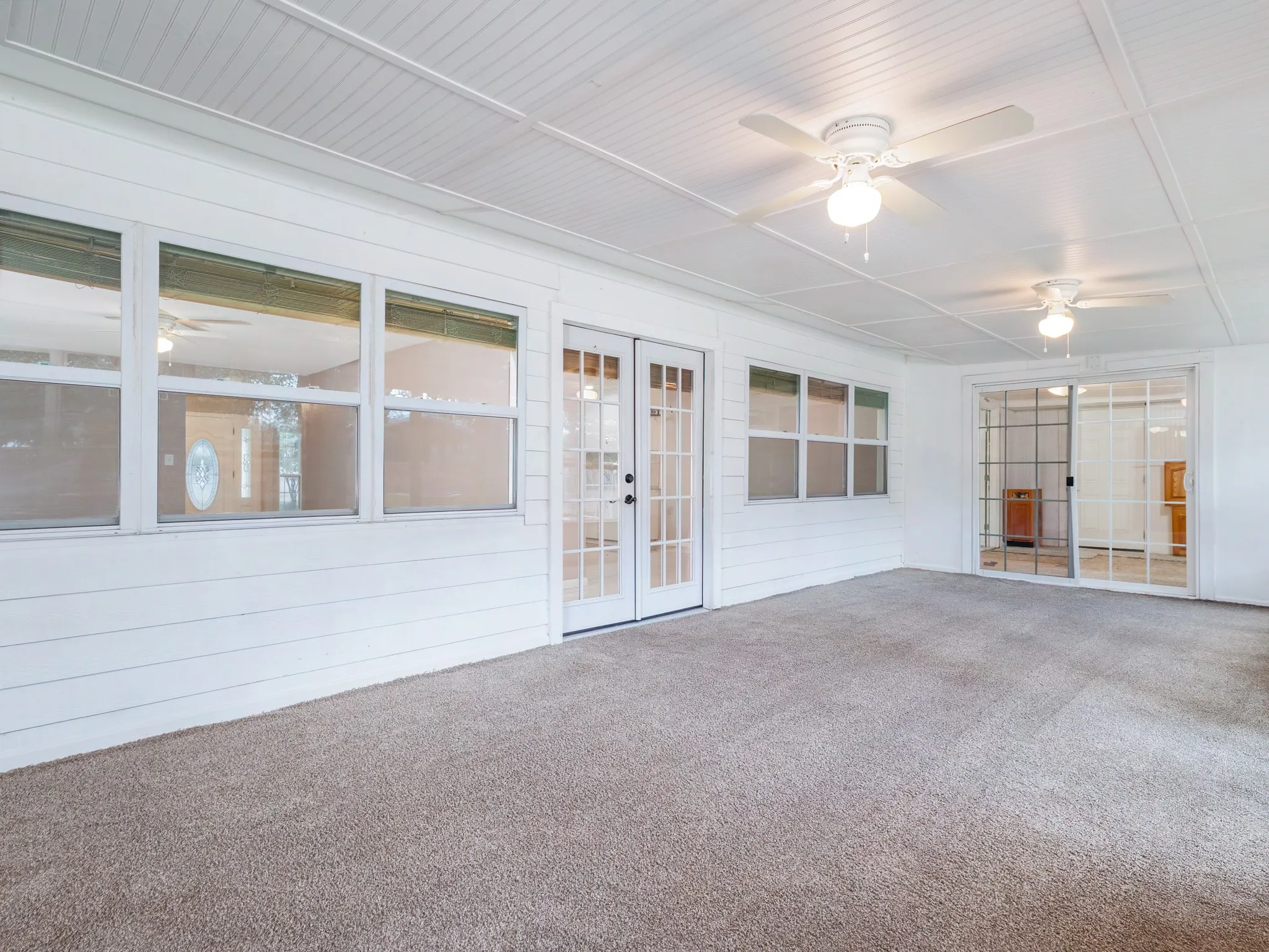 Enclosed sun room.