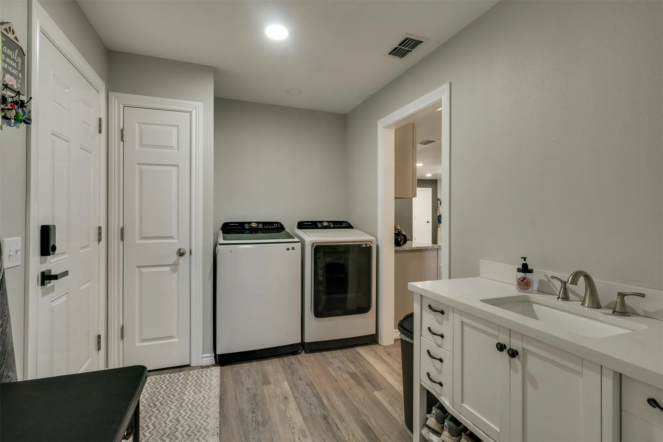 Conveniently located off of the kitchen with an entrance door from the carport.