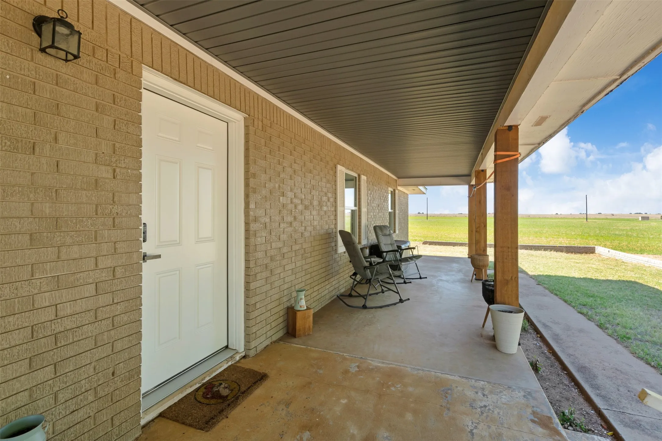 Large covered porch for enjoying the west Texas sunsets.