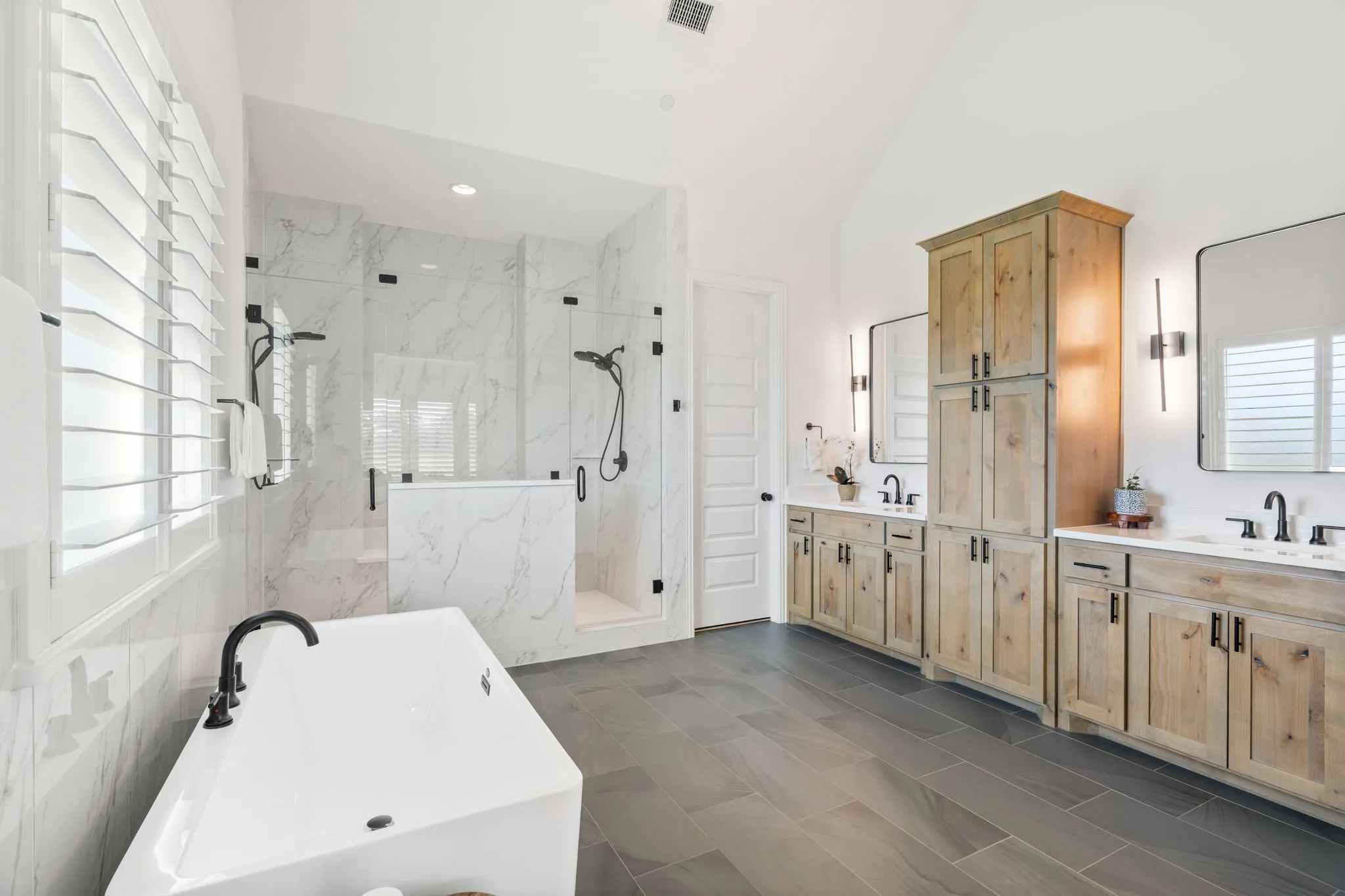 An abundance of cabinetry for storage.