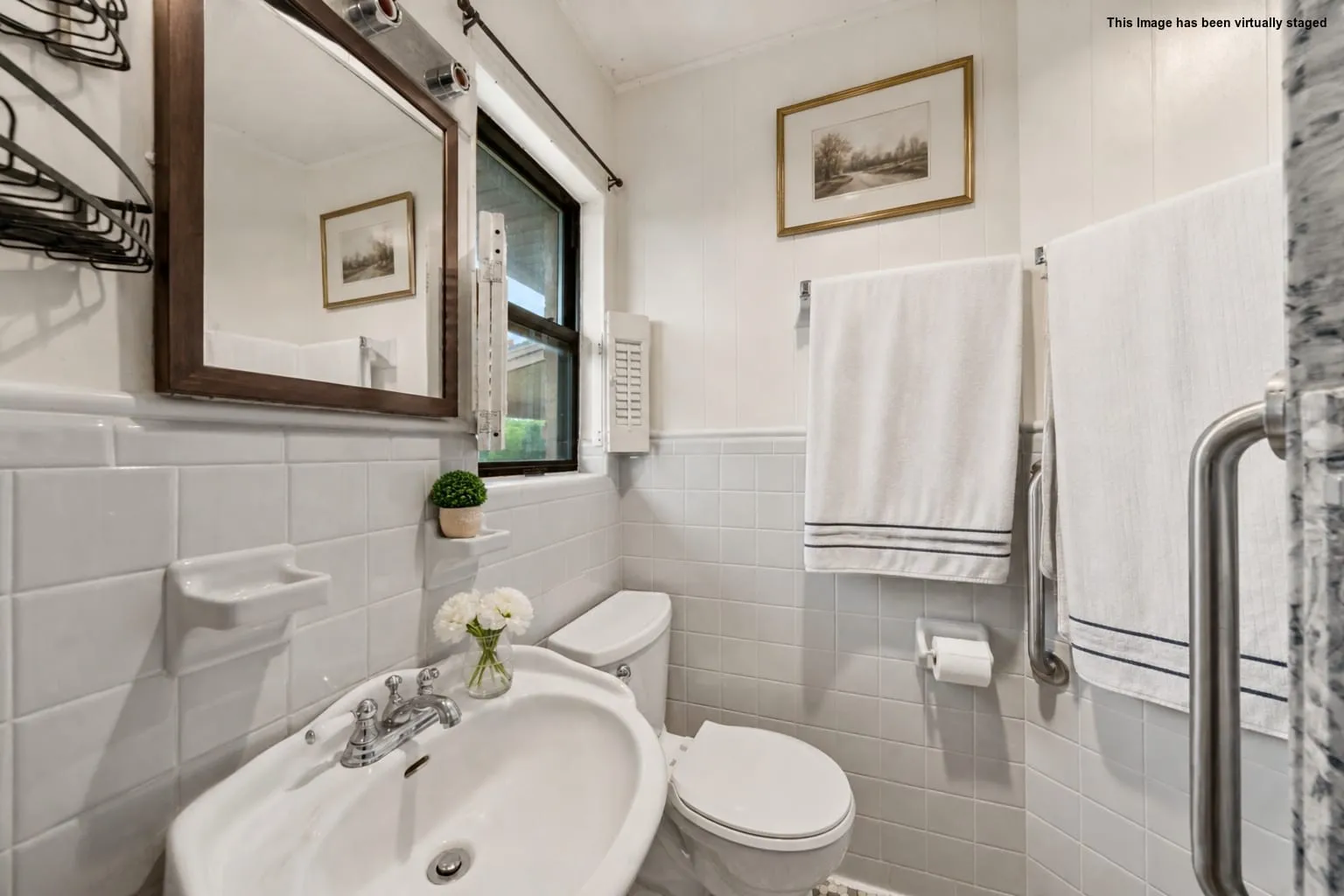 White ceramic tile walls with chair rail detailing