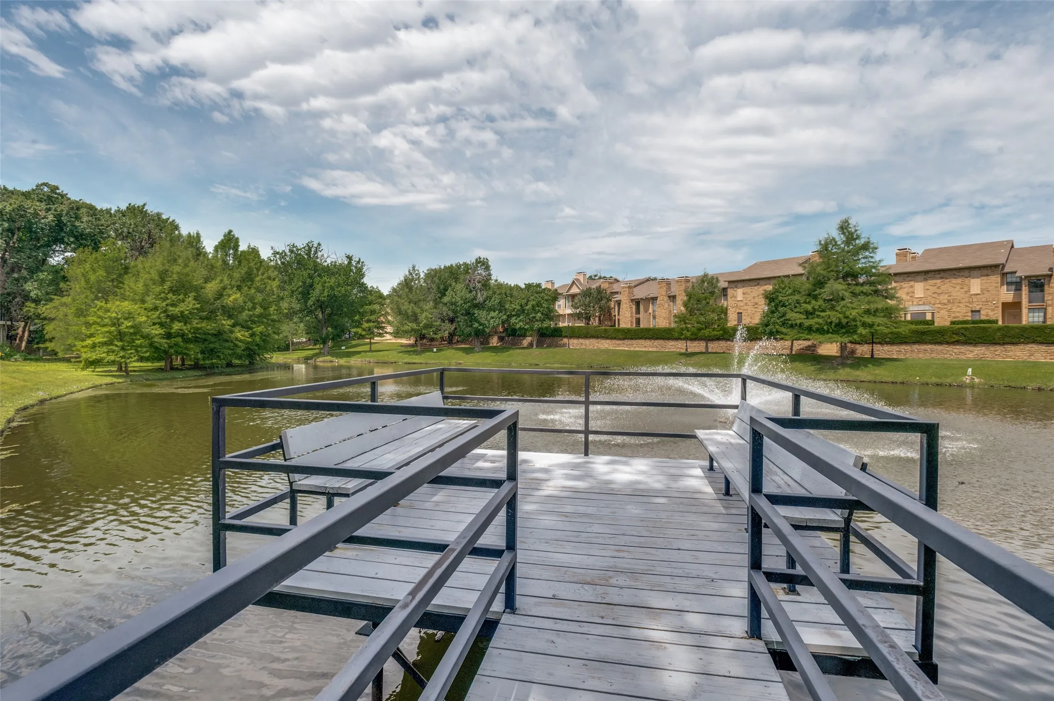 Just a few steps away from your condo is this dock with seating area- great place to relax with friends