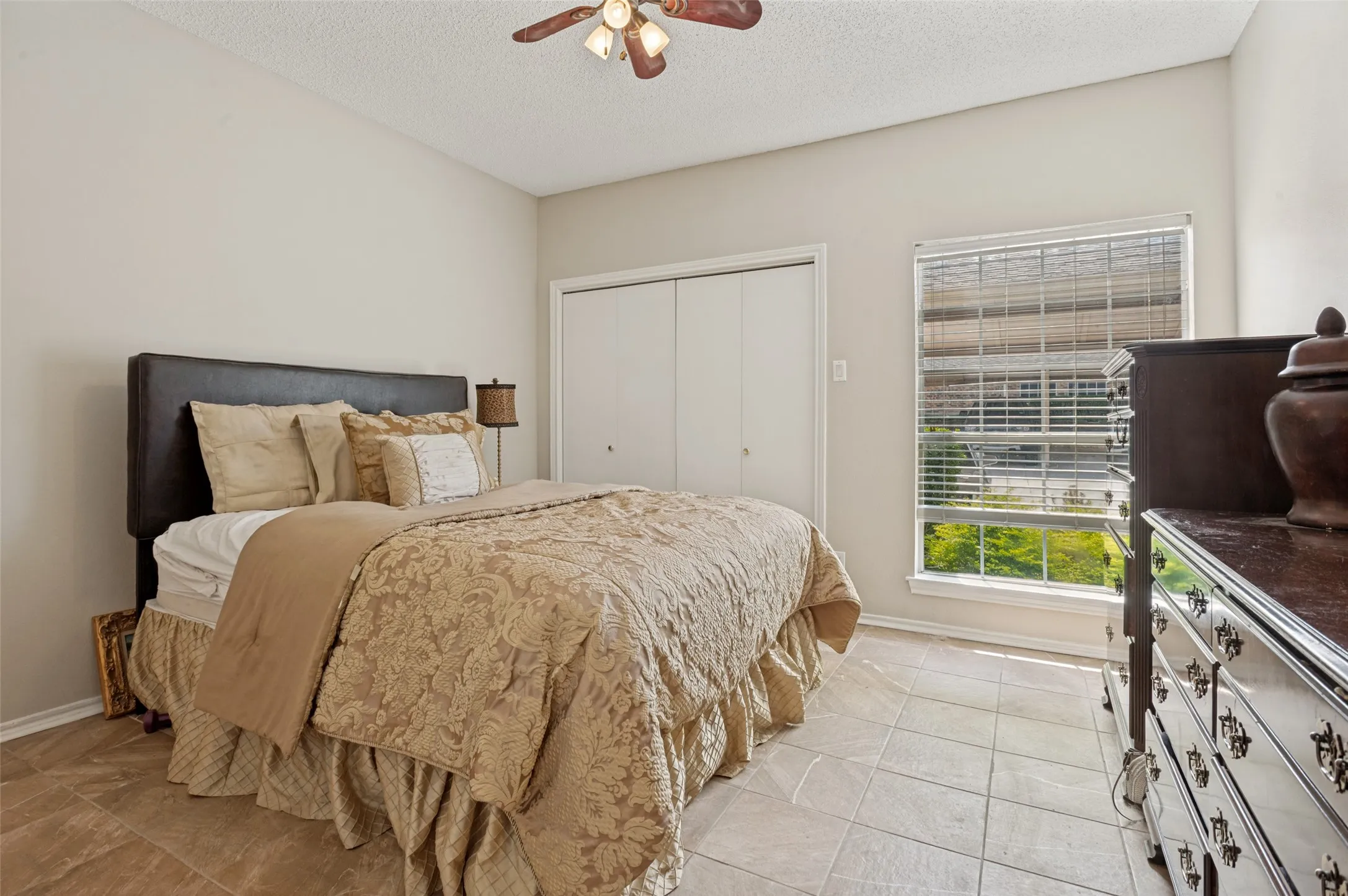 Primary bedroom with two spacious closets and ensuite bathroom