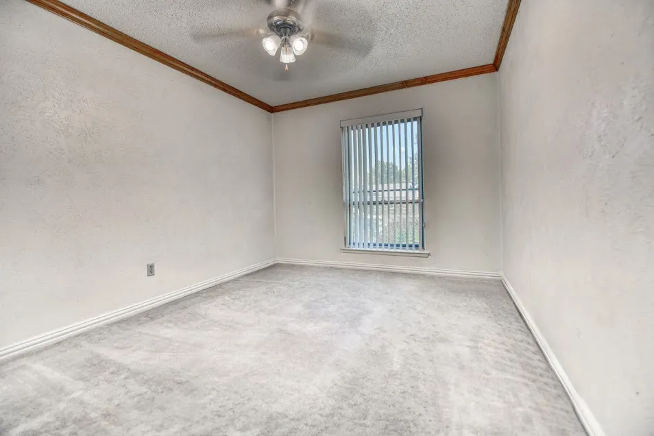Neutral-toned carpeting throughout
