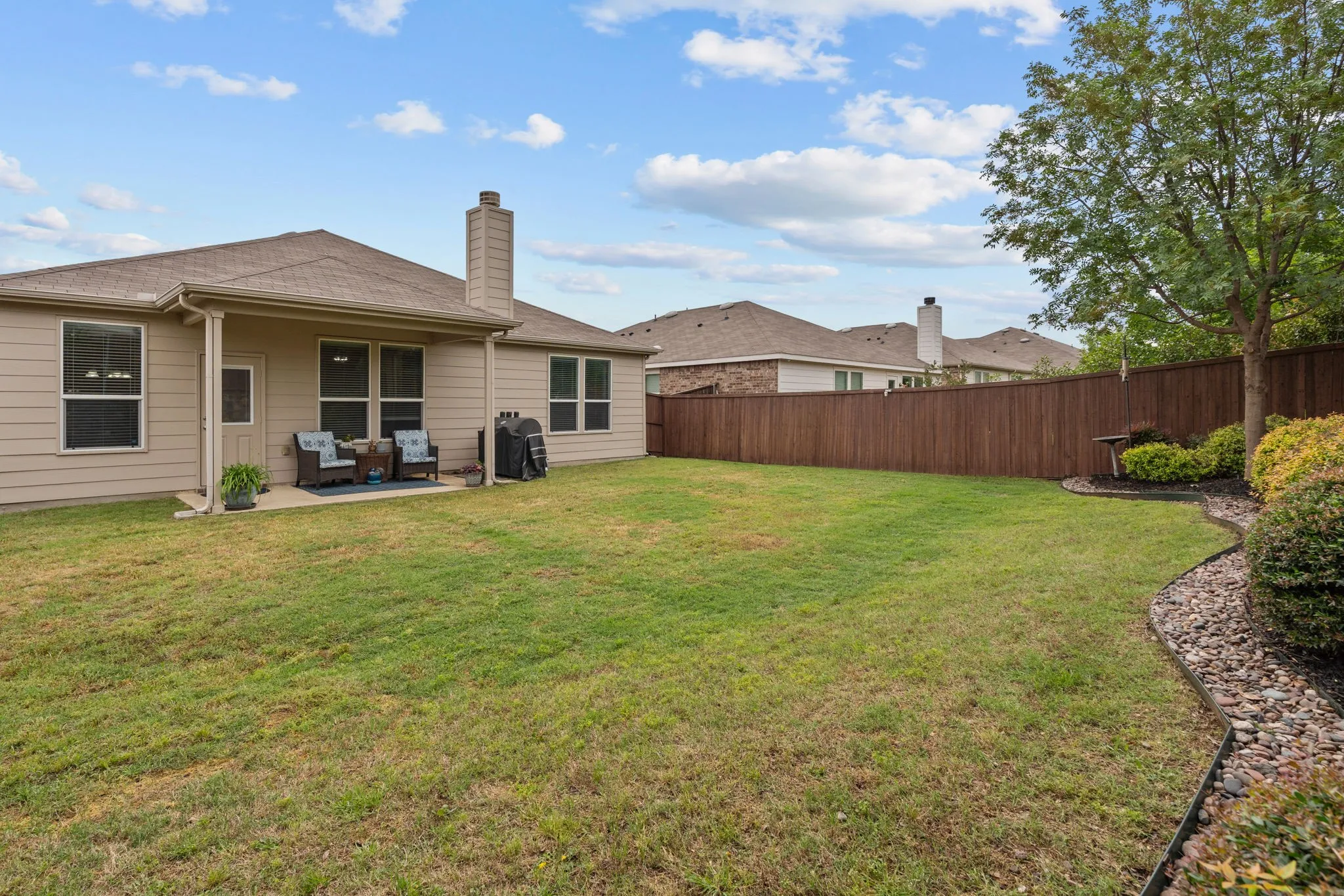 That fence was just stained! Another project and expense you won't incur anytime soon!