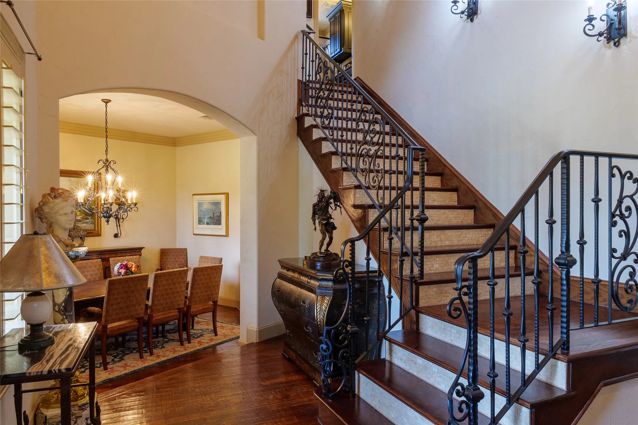 Upon entering to the left, you will find a formal dining room and an inviting staircase leading to the upper living area.