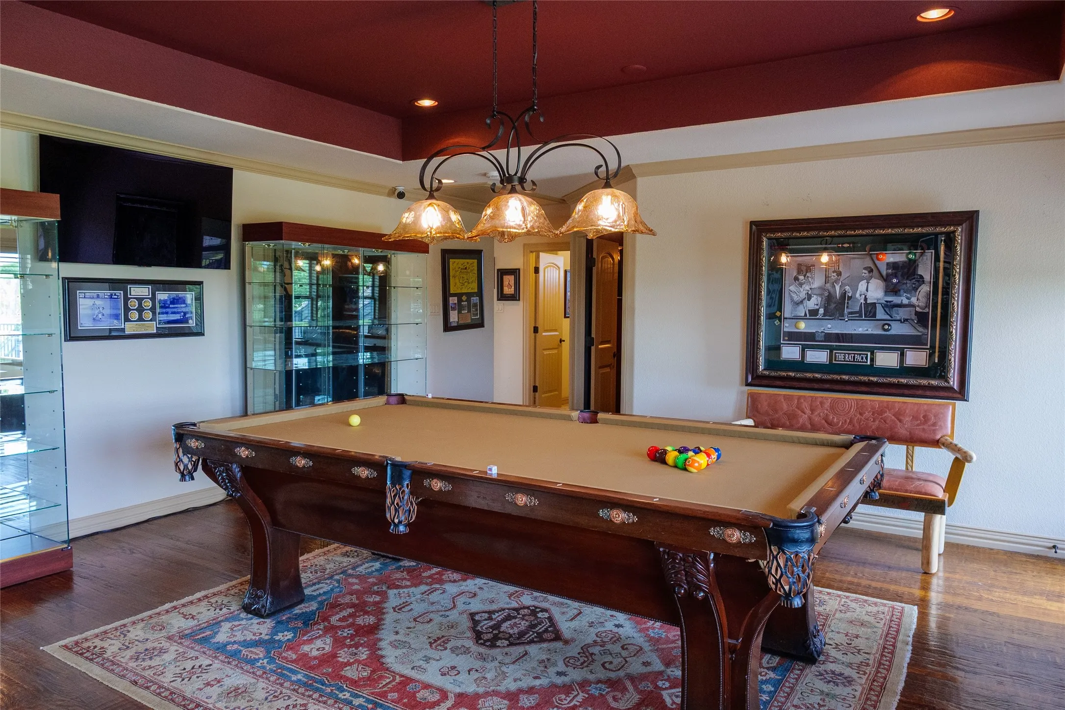 Upstairs gameroom in the main house with french doors that lead to balcony with spiral staircase for emergency access or to go down to enjoy the pool