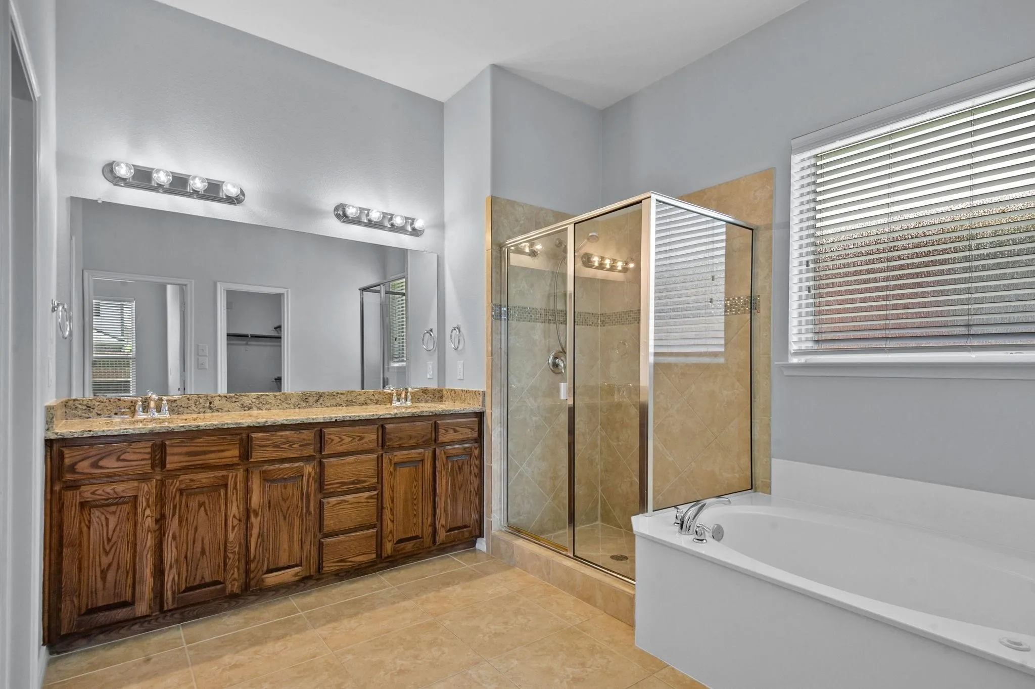 Master Bathroom #1 with dual sinks.