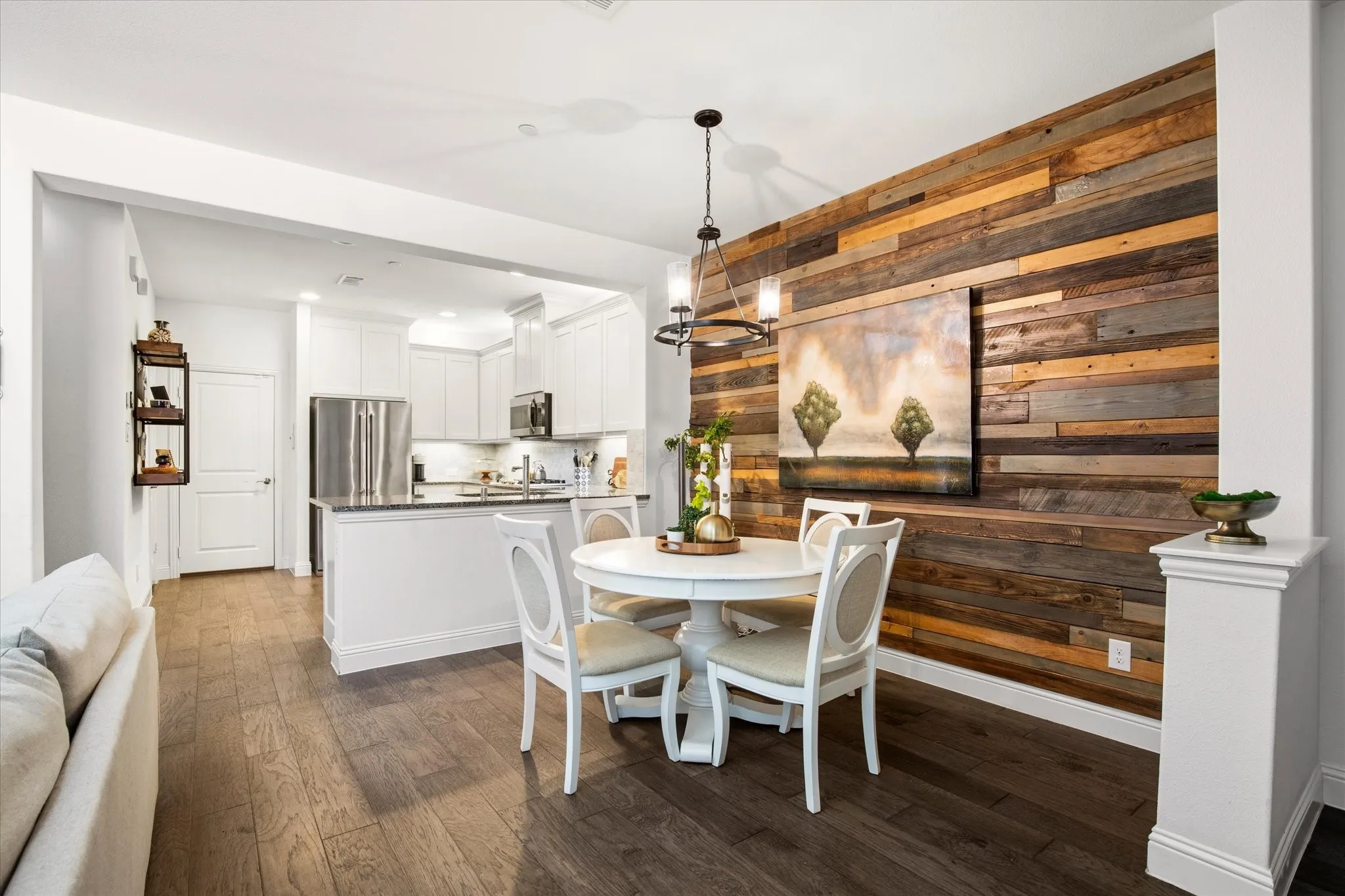 The view from the dining space into the kitchen.