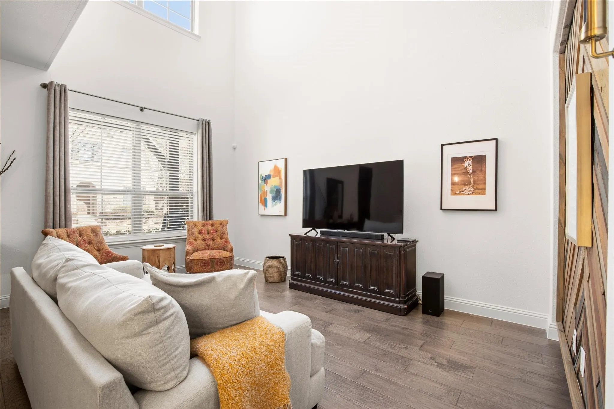 The living room's layout enables for any size furniture.