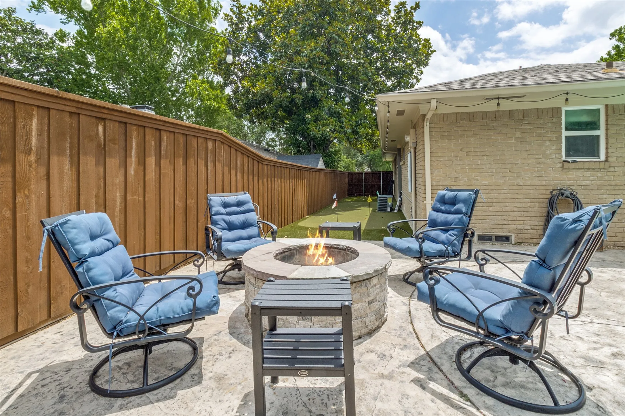 Relax on cool evenings near your built in fire pit.