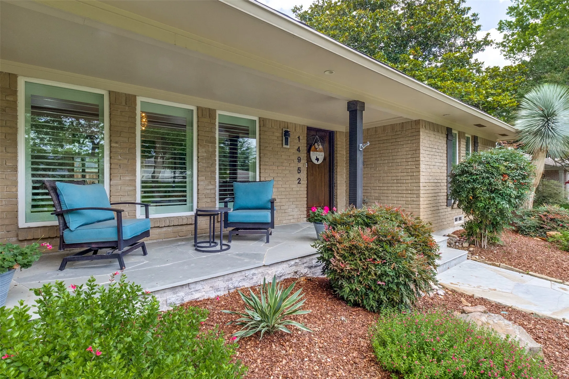 Relax on your front porch perfect for morning coffee.