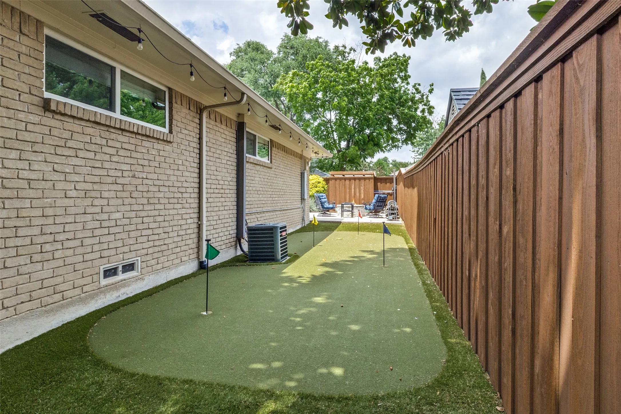 Practice your putts on this backyard putting green.