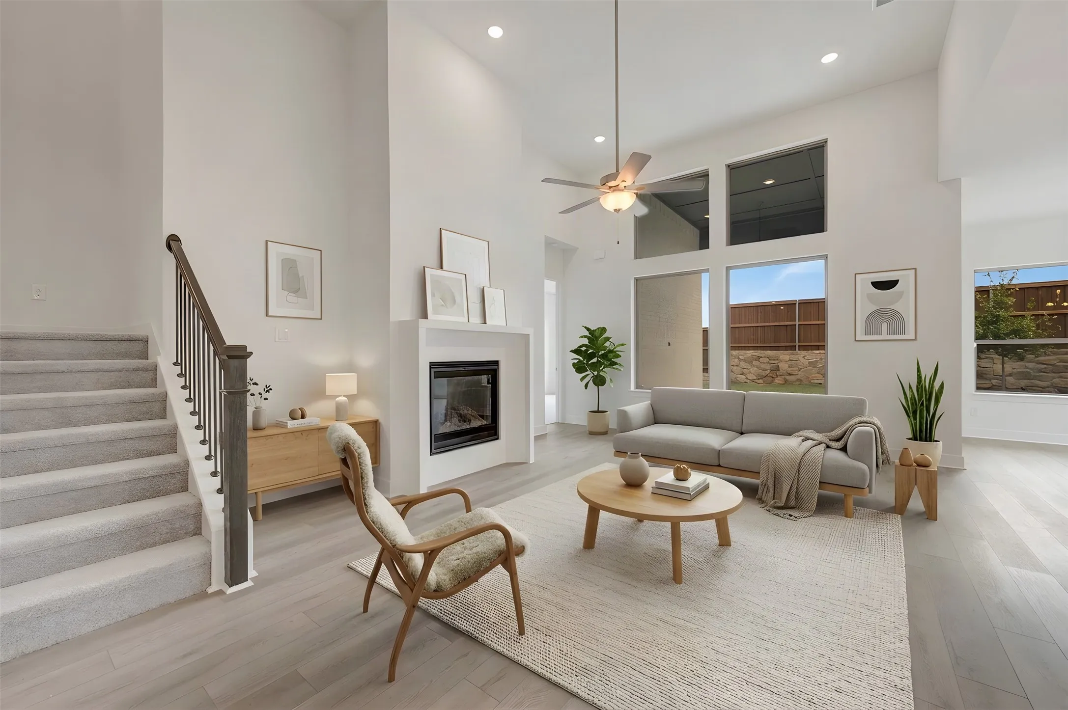 Vaulted ceilings, a built-in fireplace, and expansive windows