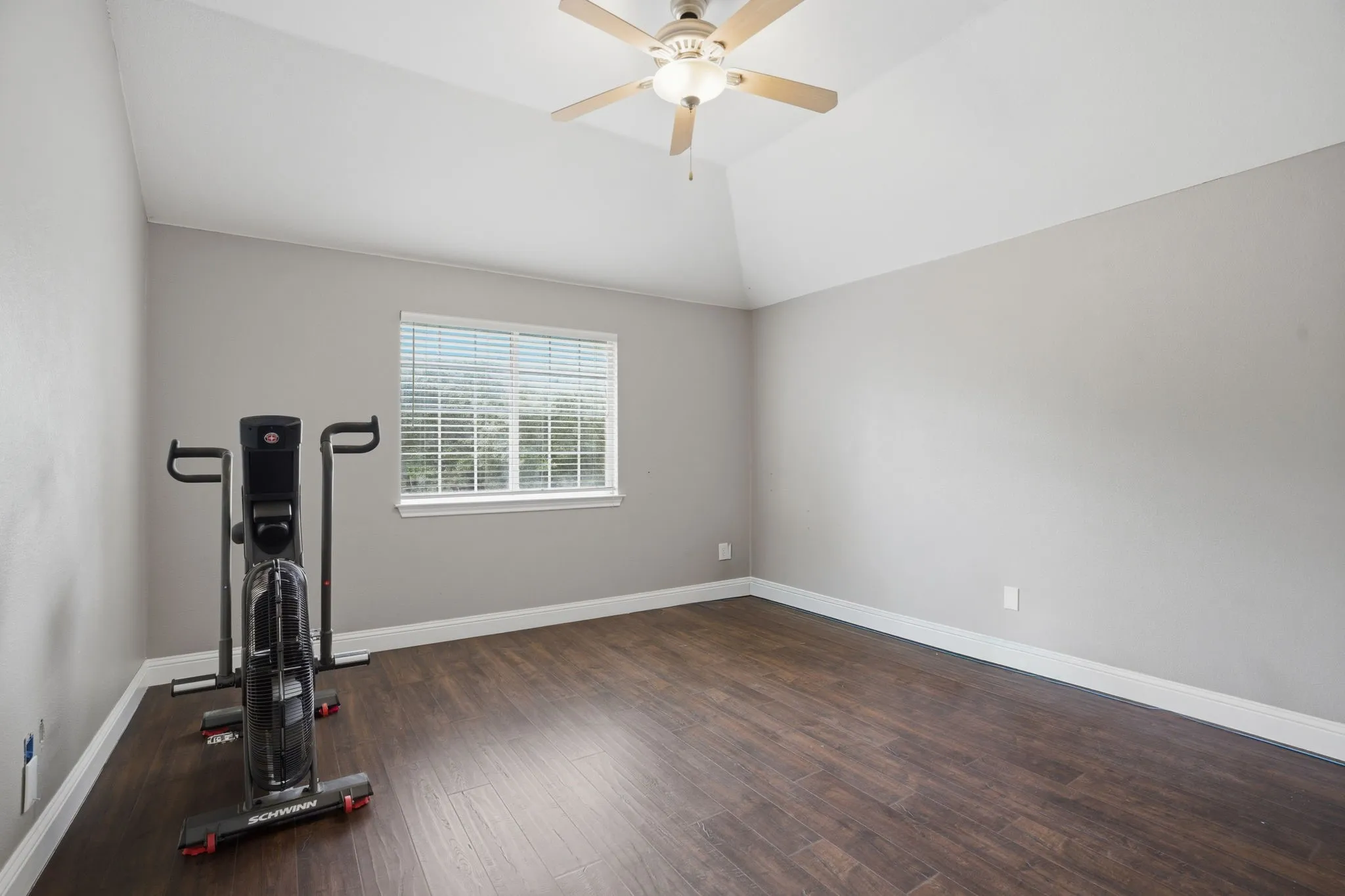 Flex room adjoined to primary bedroom with closet space and pocket door.