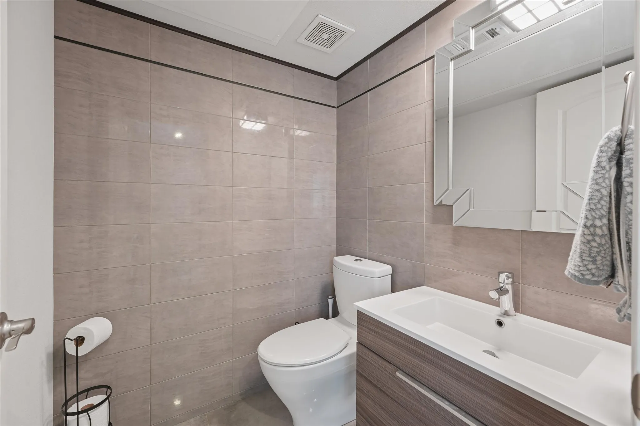 half bathroom in fourth bedroom or office on third floor