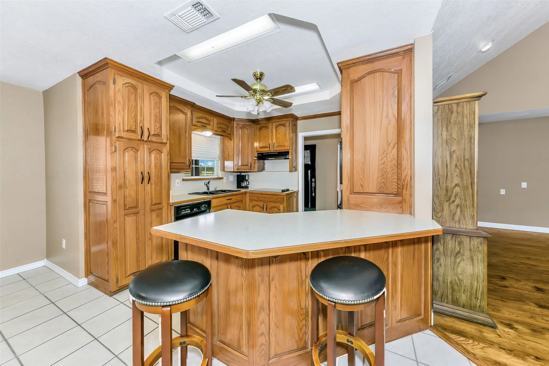 Custom cabinets and tile floors.