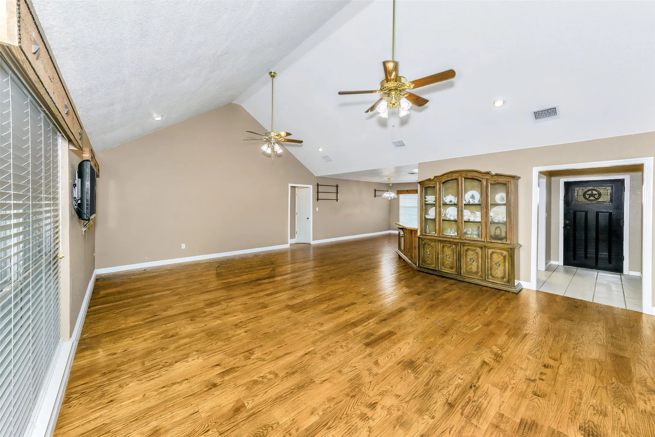 Vaulted ceilings, and custom wood floors.