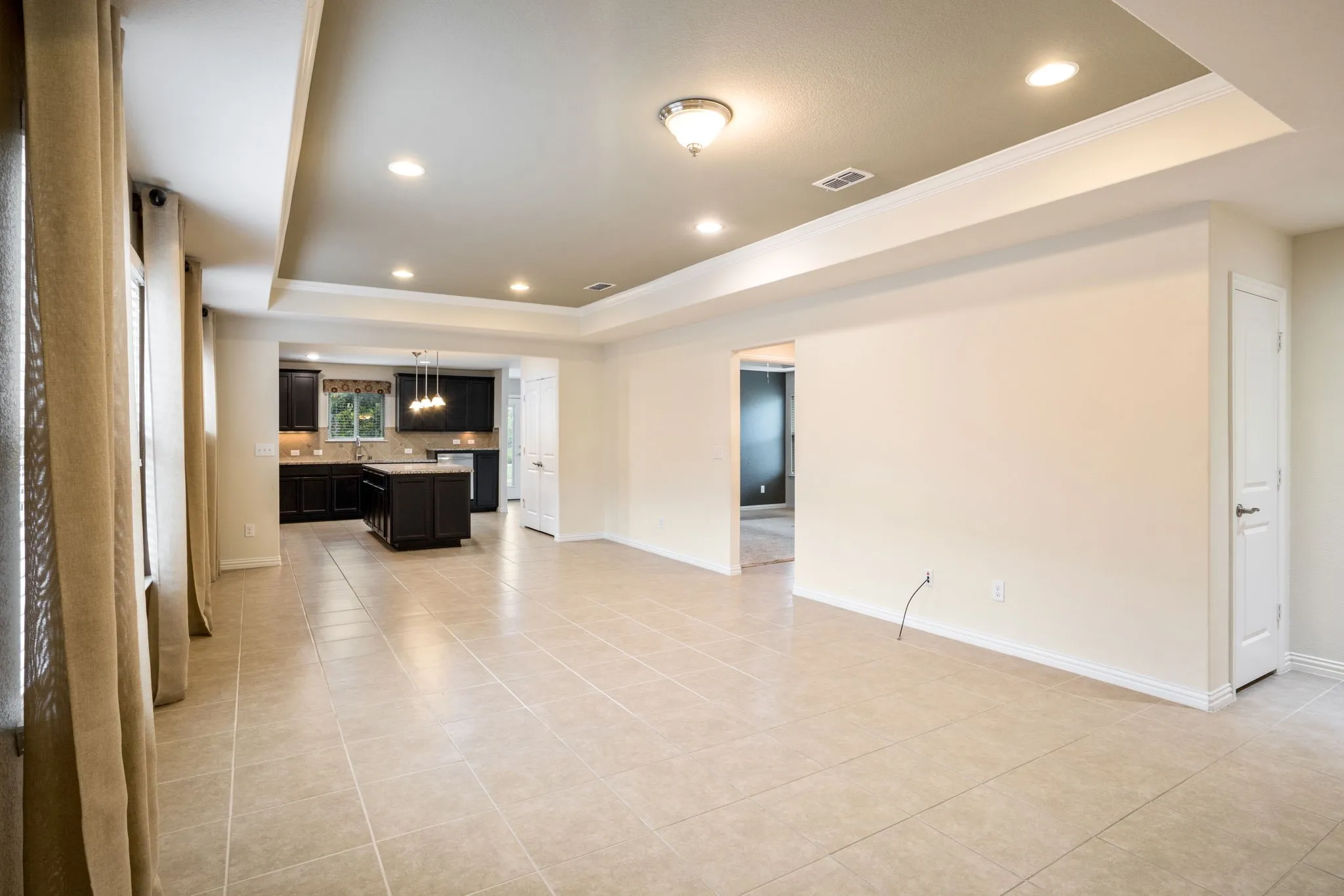 Open concept Dining Room-Living Room with tile floors.