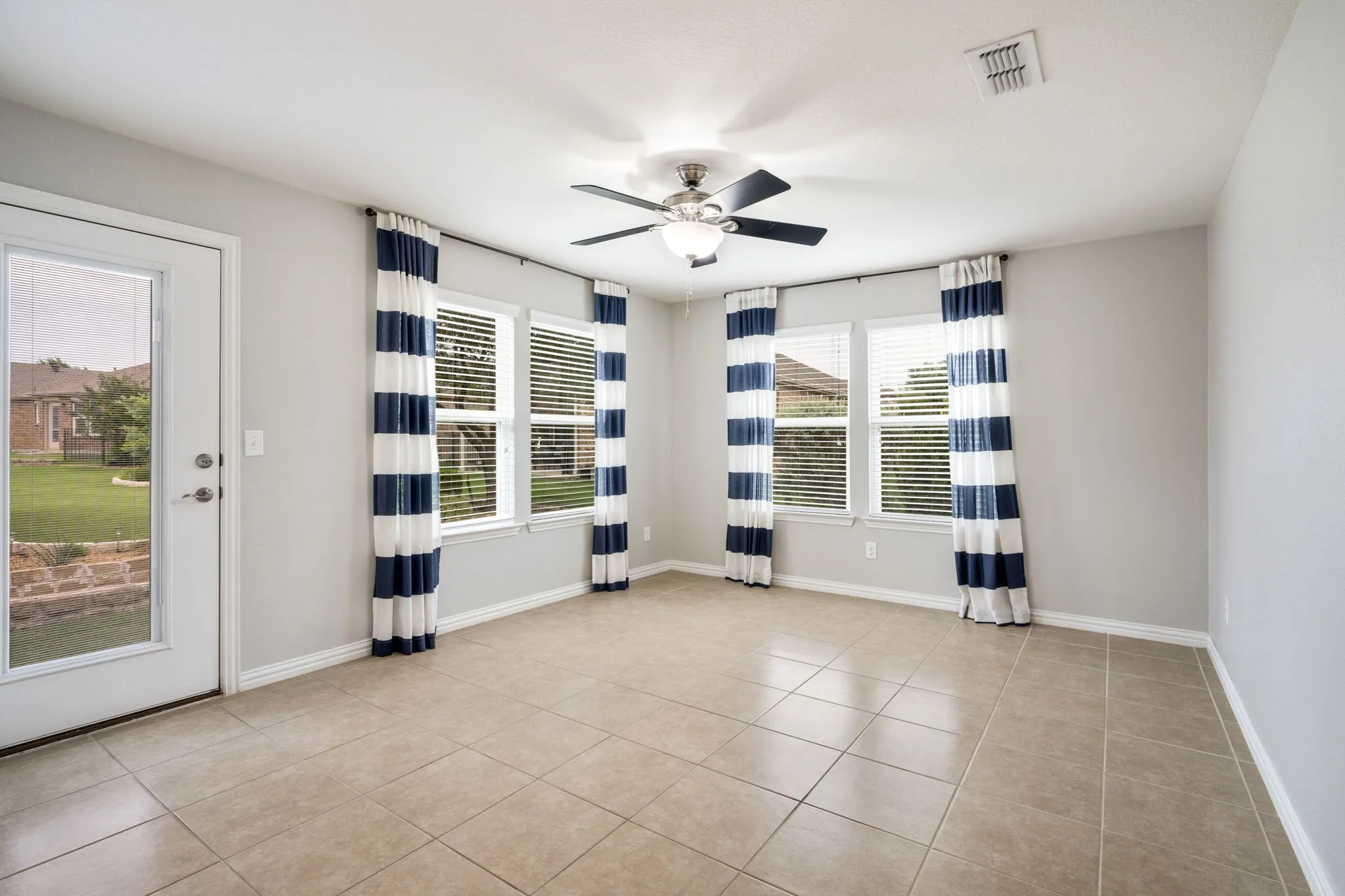 Den-Sunroom is extra large for games, movies or relaxing!