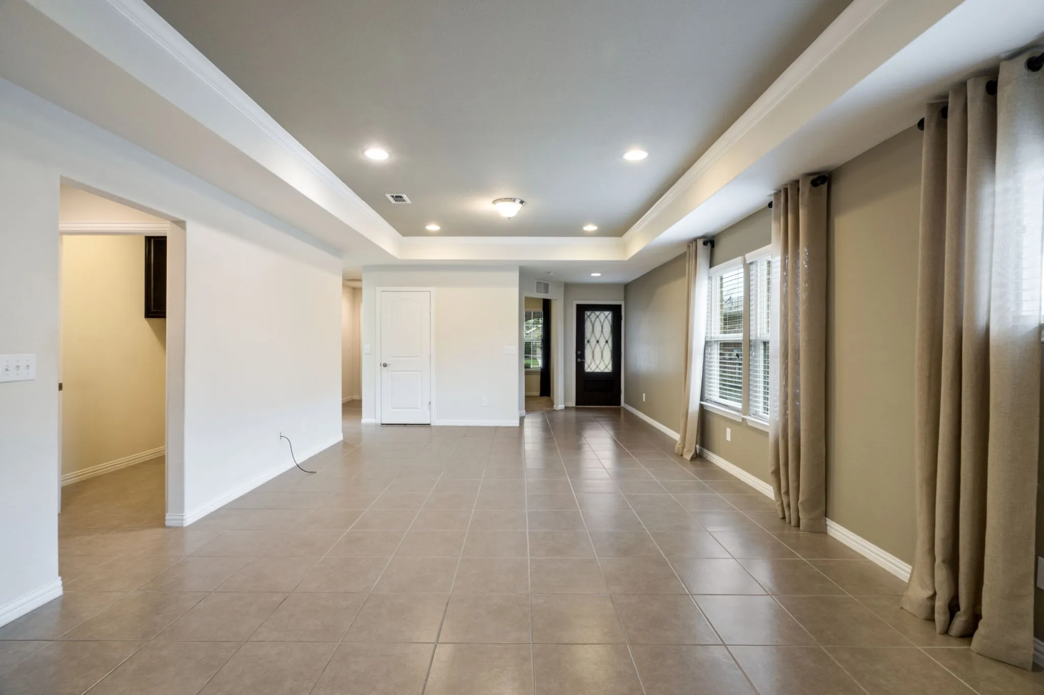 Open Concept Living Room-Dining Room with Tile floors.