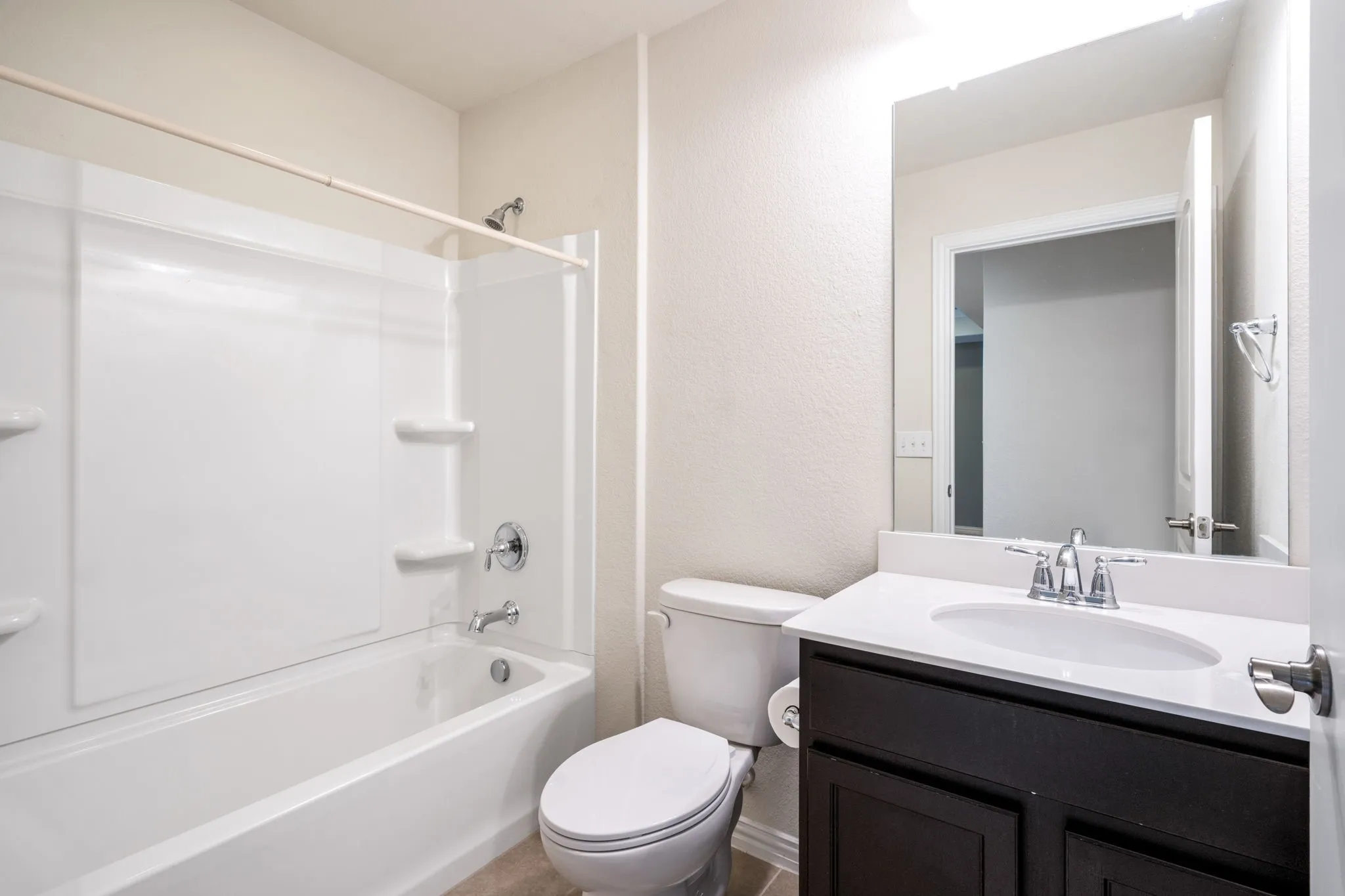 Guest Bath with tub-shower combo.