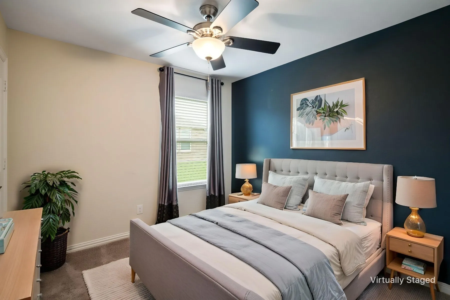 Virtually Staged Bedroom with accent wall and ceiling fan.