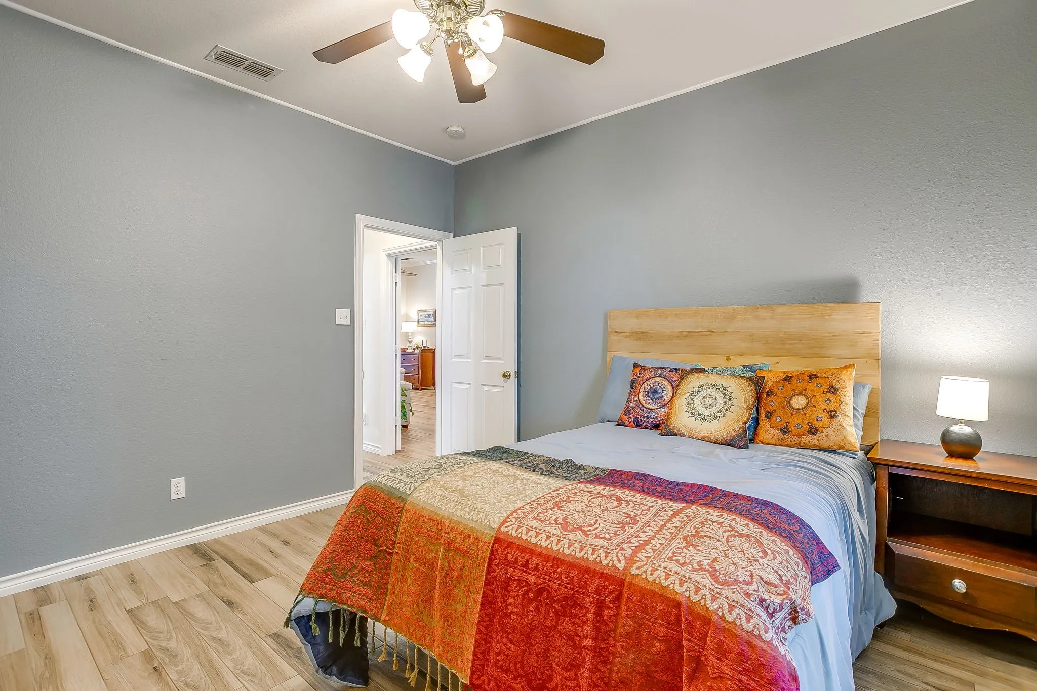 Comfortable secondary or guest bedroom.