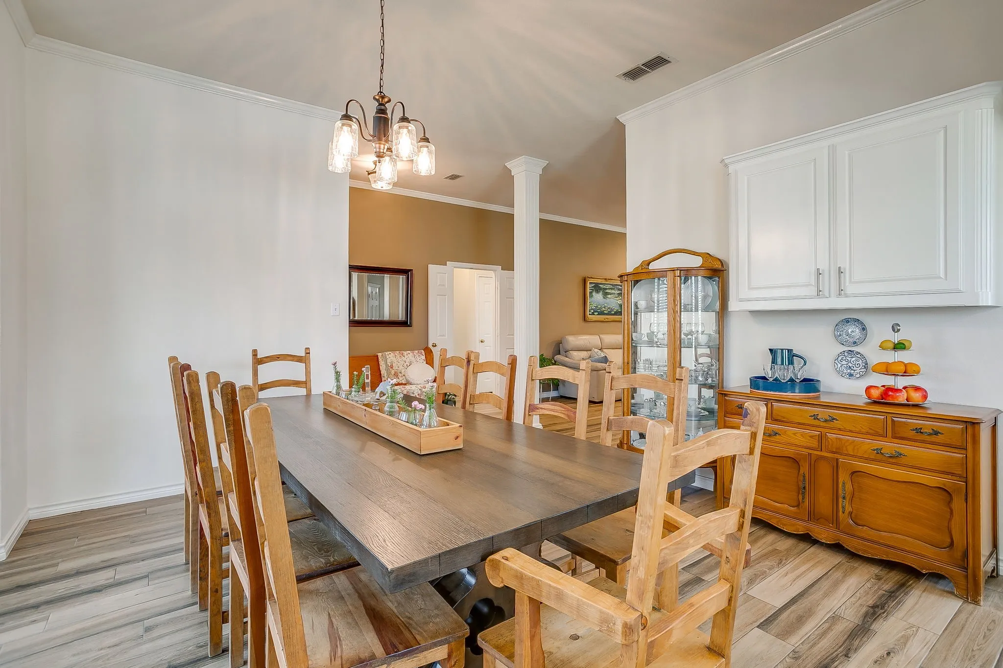 Dining wall with storage cabinets.