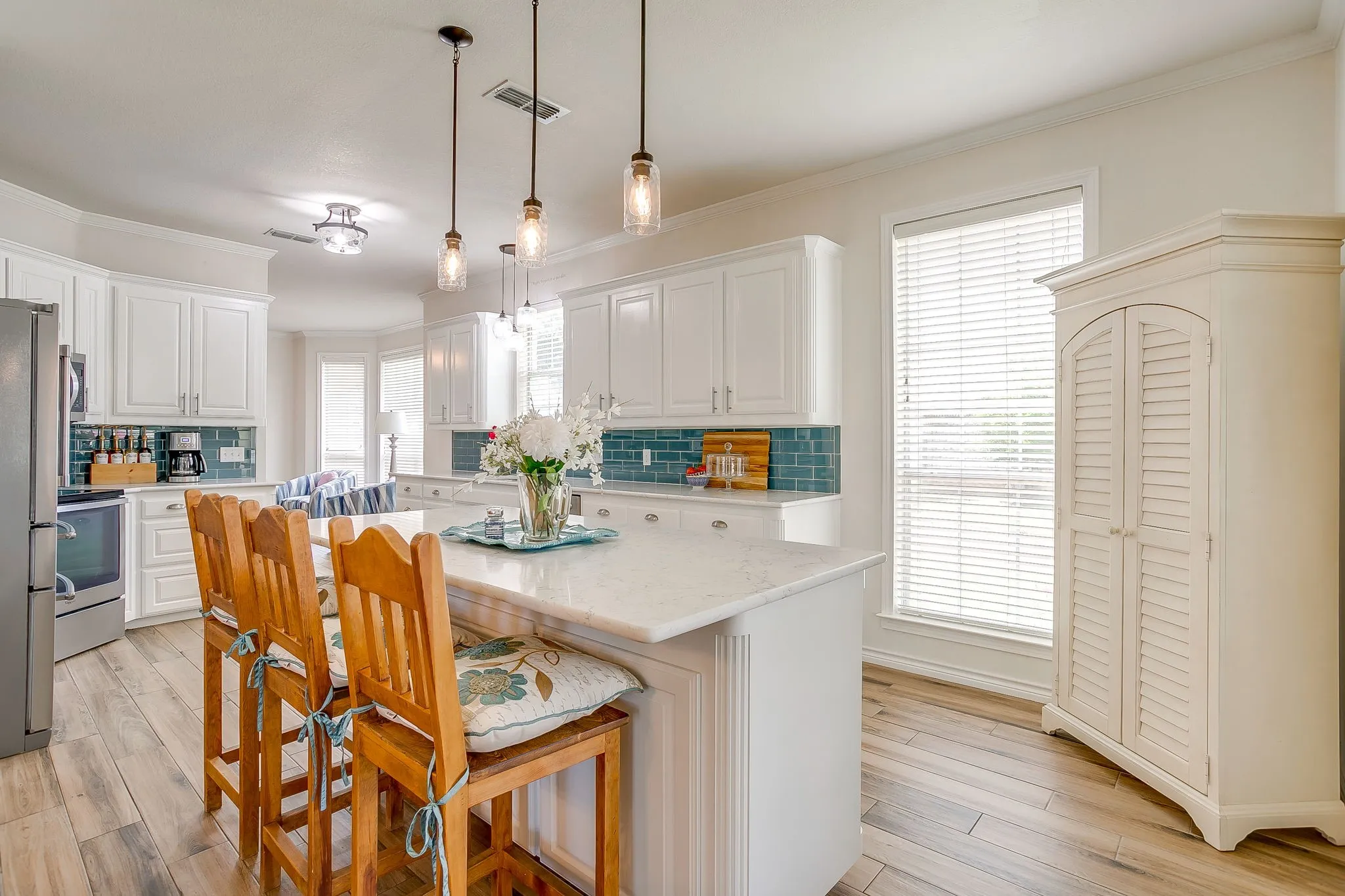 Kitchen island with breakfast bar.