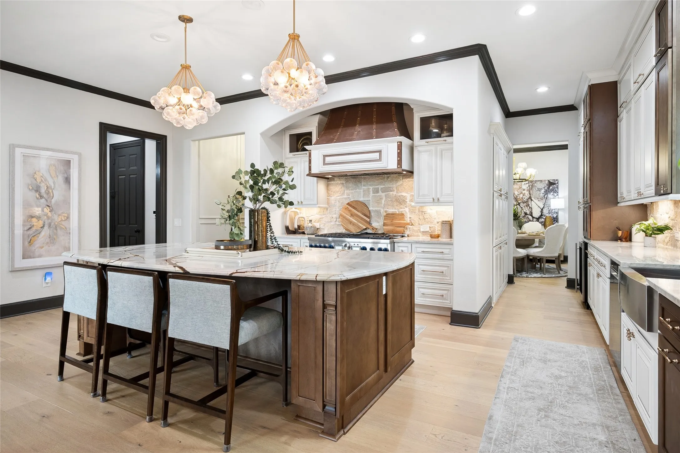 Remodel included adding additional cabinets, soft close drawers, spice rack, backing pan storage, pot drawers and pull-out shelving in the pantry and under the sink