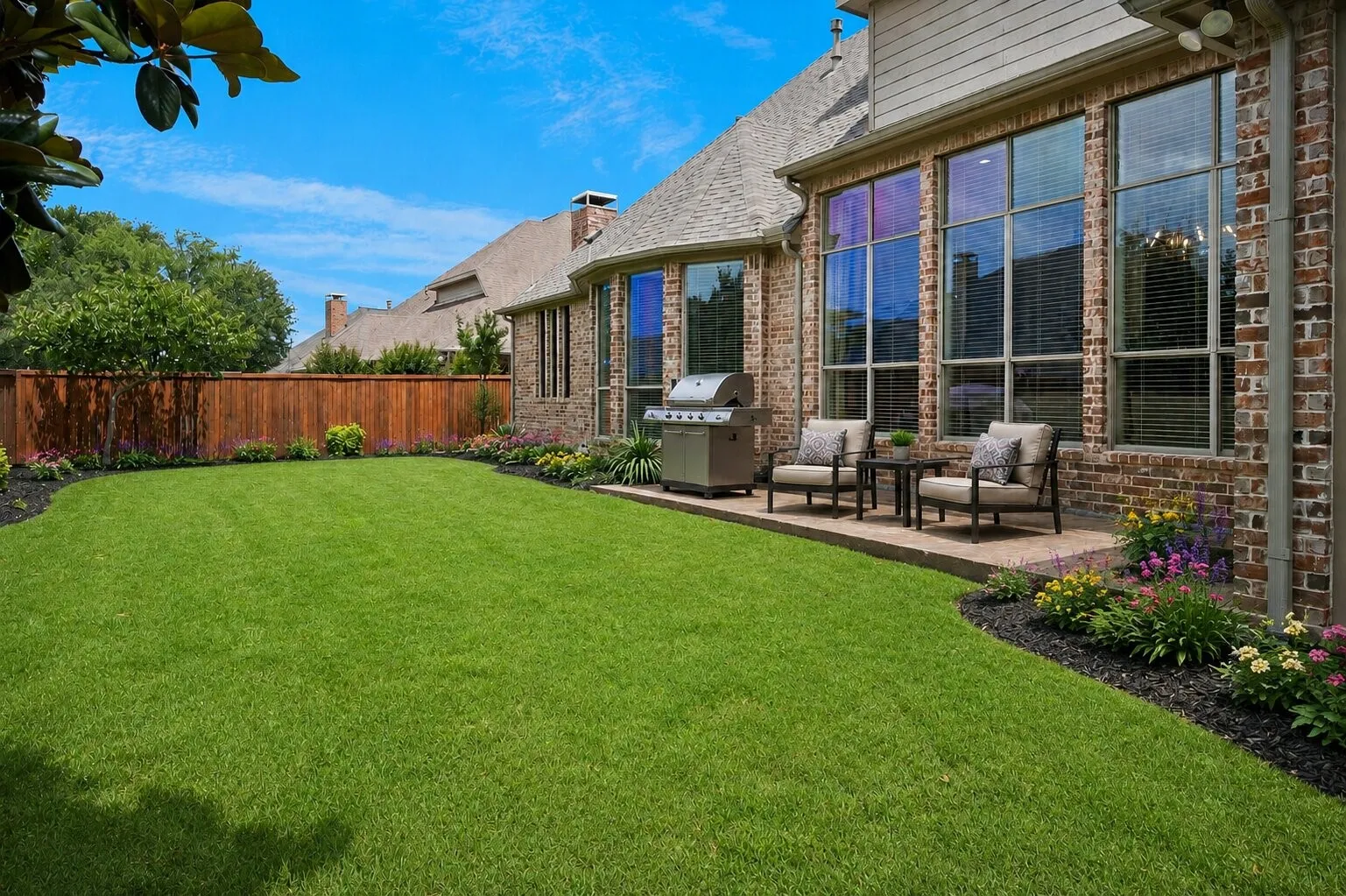 (Virtually staged photo of backyard) Back of home and large grass space for a future pool.