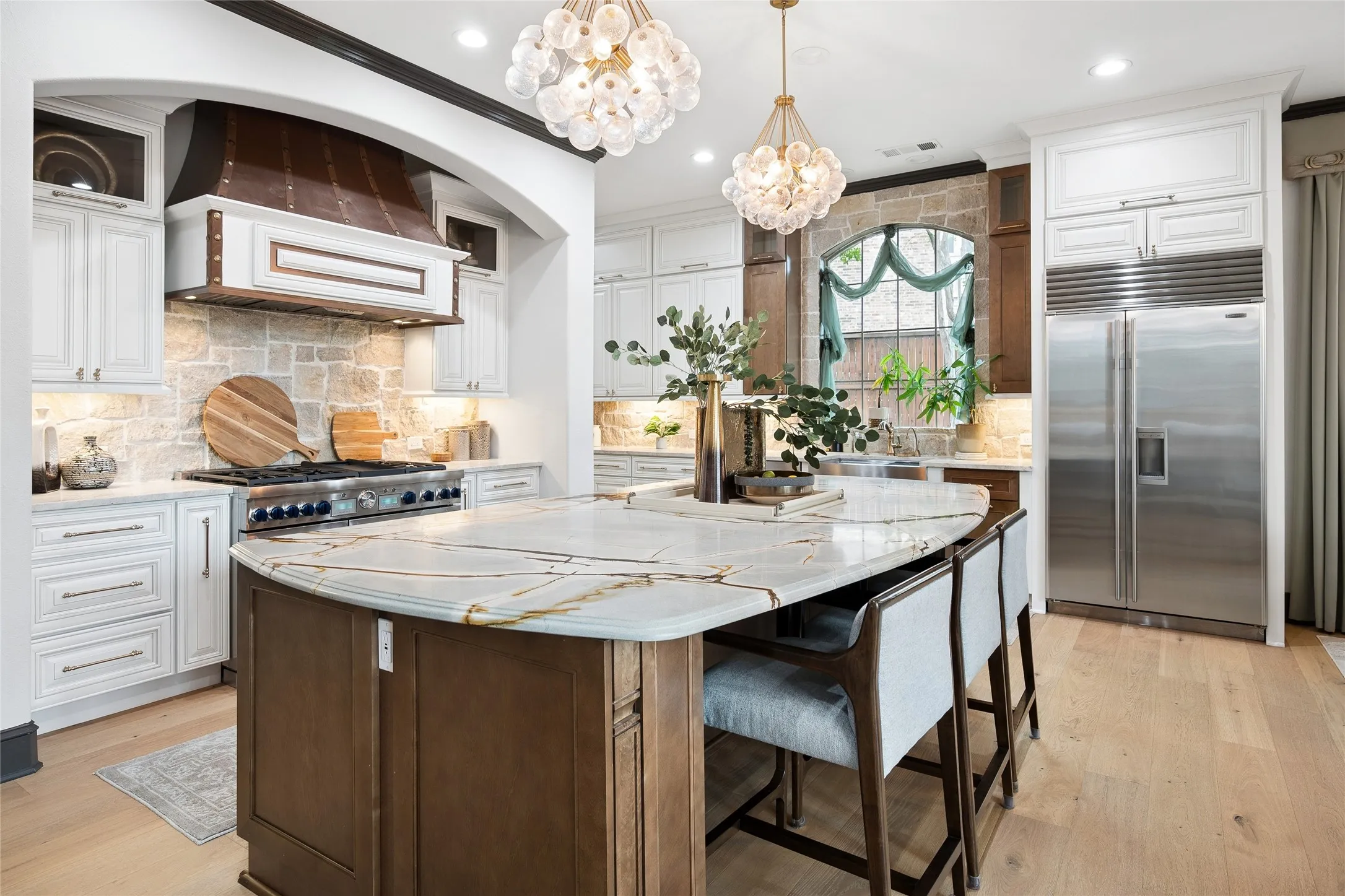 Counter height island bar seating has additional storage