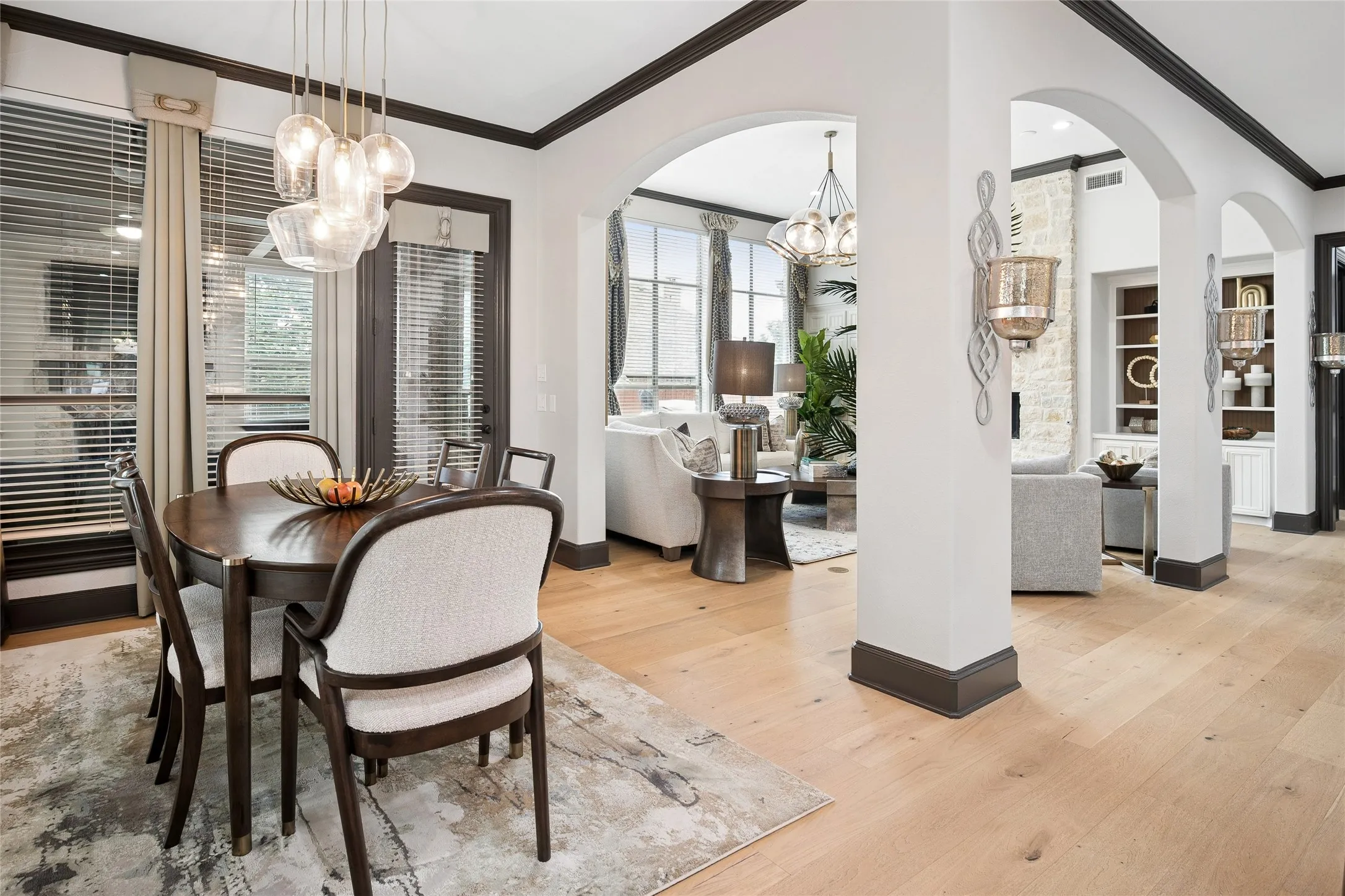 Charming view from kitchen with the subtle arched openings to the living area.