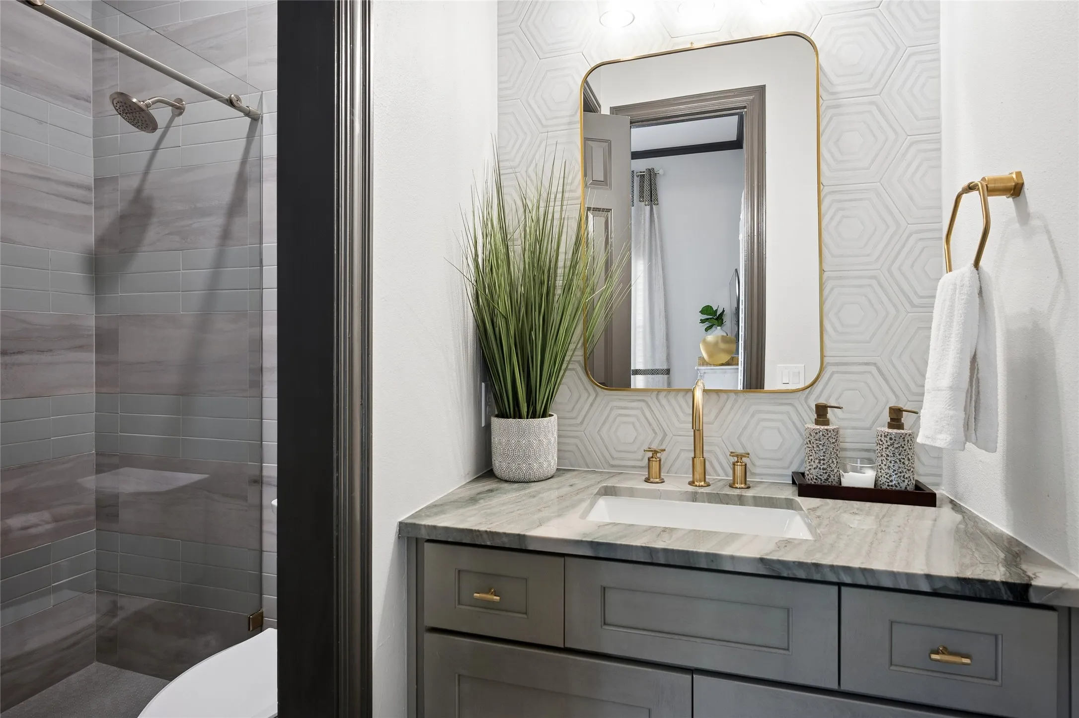 En-suite guest shower bath. Not shown is a large walk-in closet.