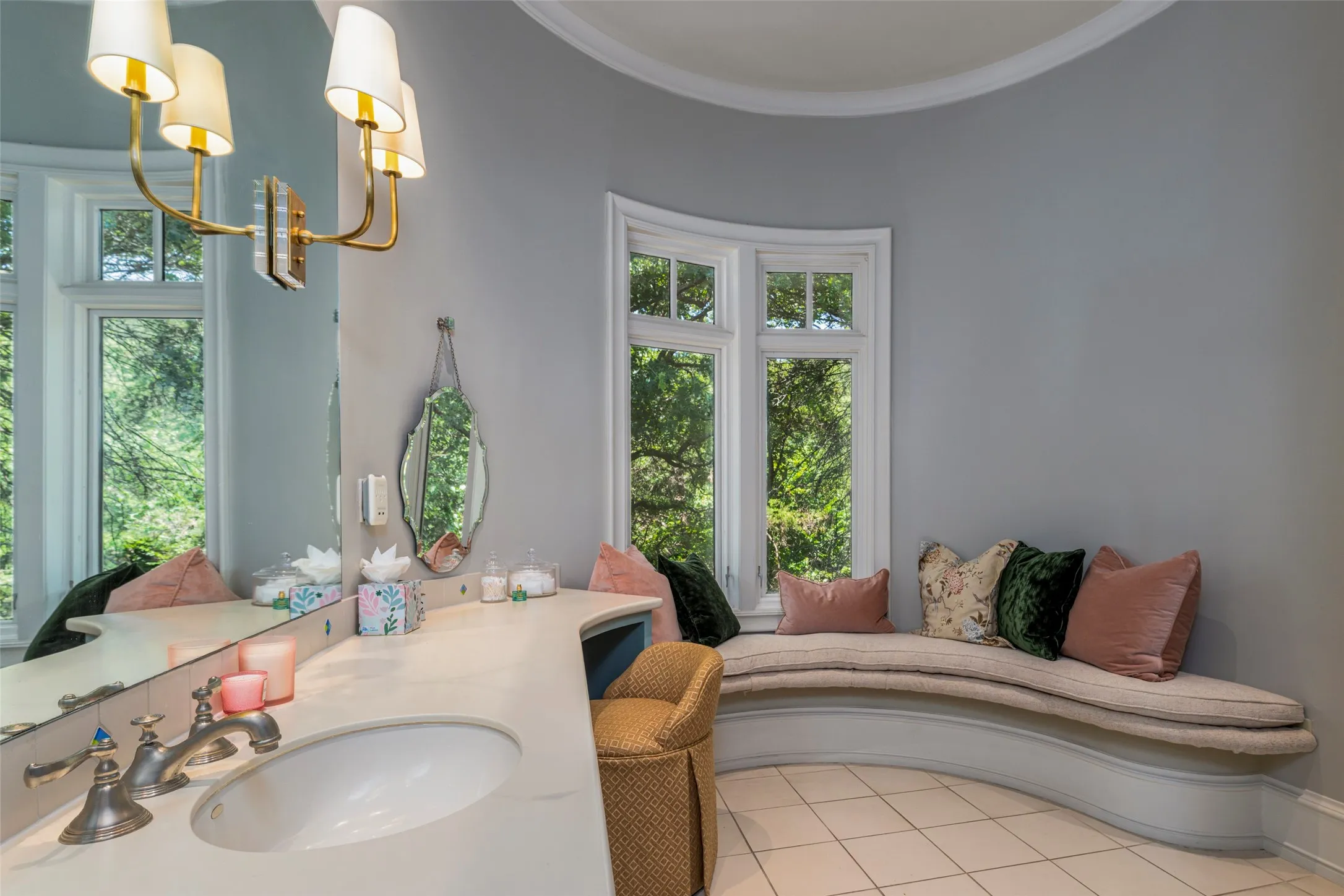 The ensuite bath is light and cheery with window
seat and includes a walk-in closet.