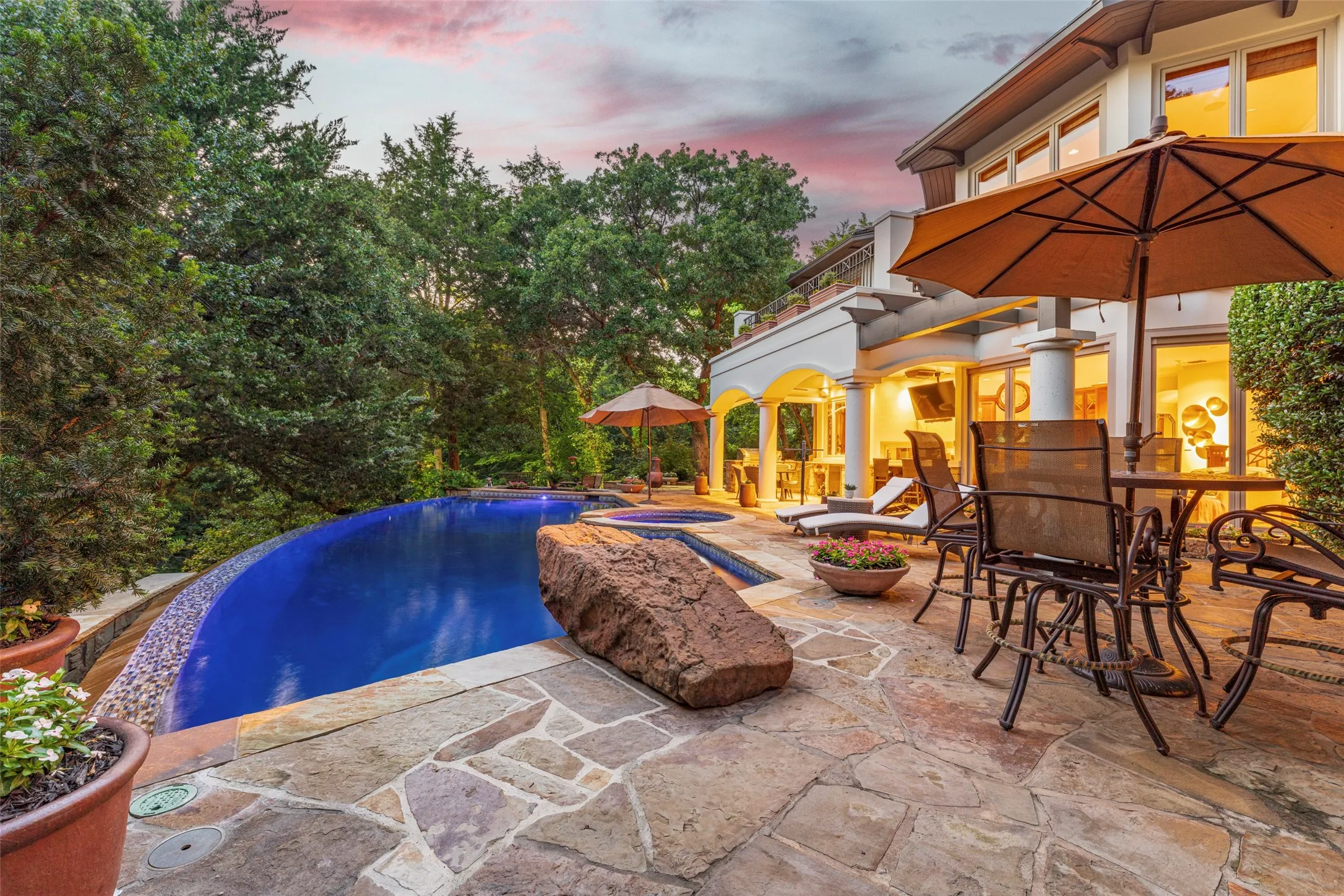 The home truly embraces a resort-like feel with the
beautiful surroundings! The pool is heated and can be enjoyed year-round.