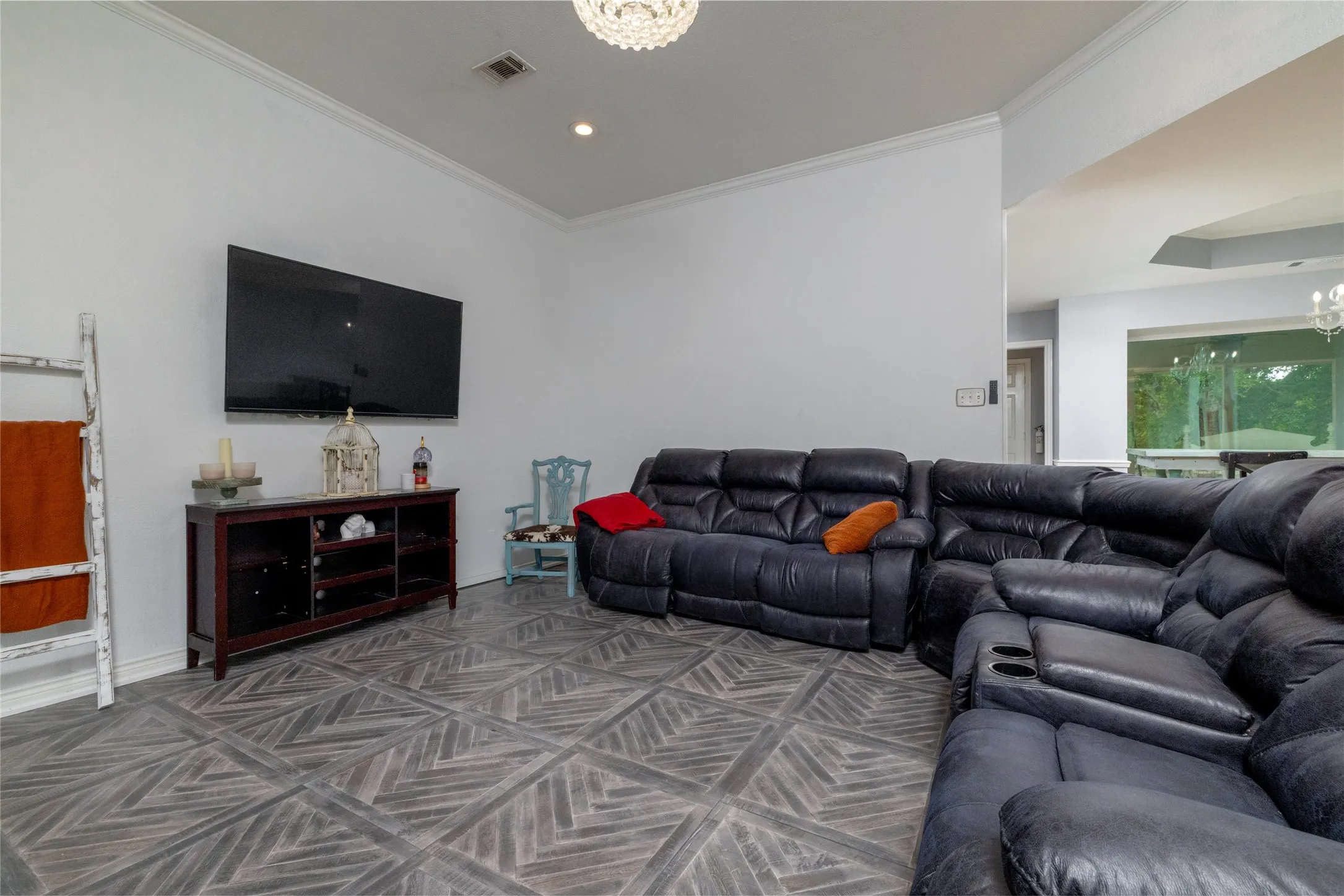 Spacious room featuring patterned tile flooring